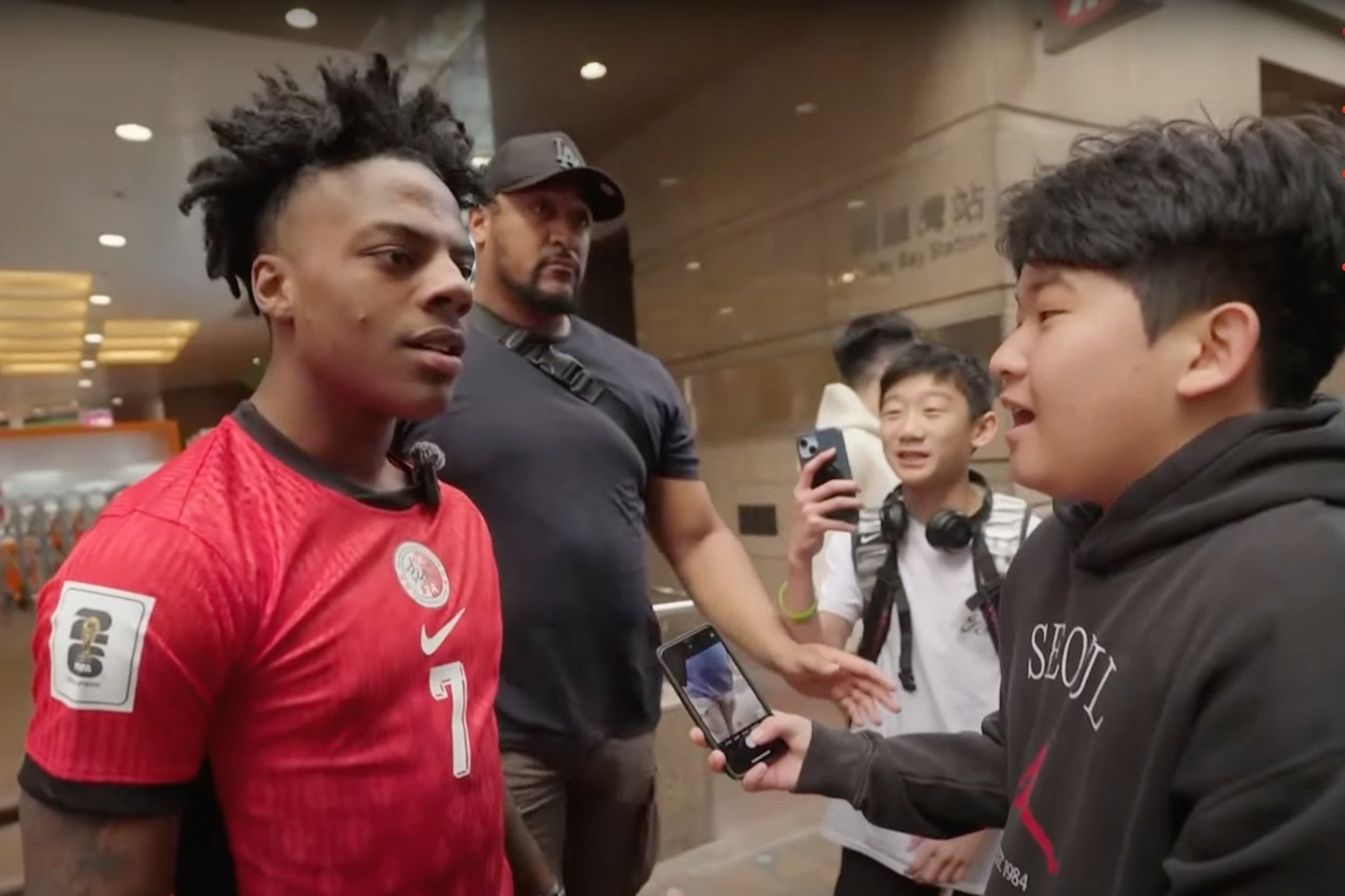 Fans stop to chat with IShowSpeed (left) in Causeway Bay. Photo: YouTube/IShowSpeed Fans stop to chat with IShowSpeed (left) in Causeway Bay. Photo: YouTube/IShowSpeed