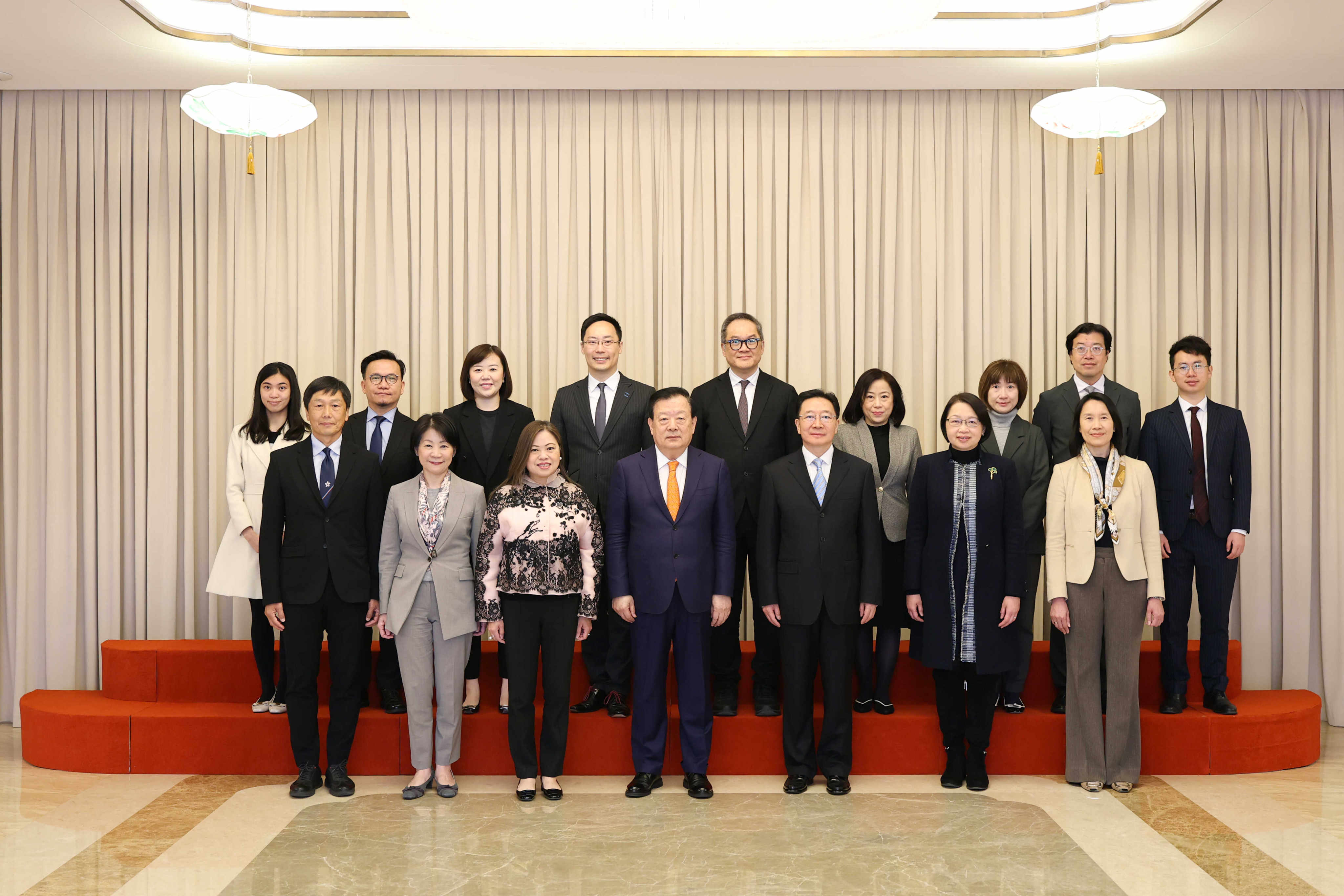 Hong Kong tourism chief Rosanna Law (front row, third left) met Xia Baolong (front row, centre) in Beijing. Photo: Handout