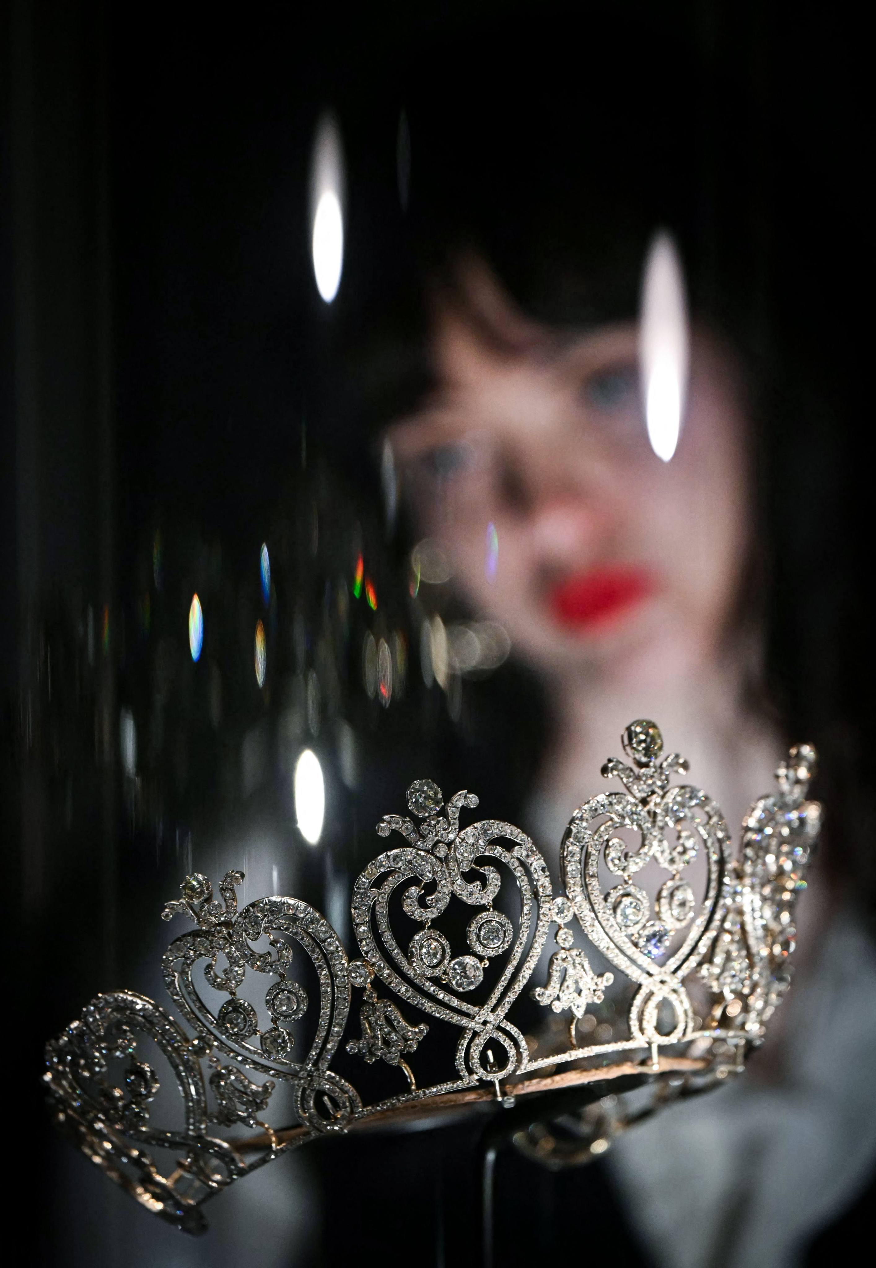 A visitor looks at The Manchester Tiara, featured in Cartier at London’s V&A. Photo: AFP