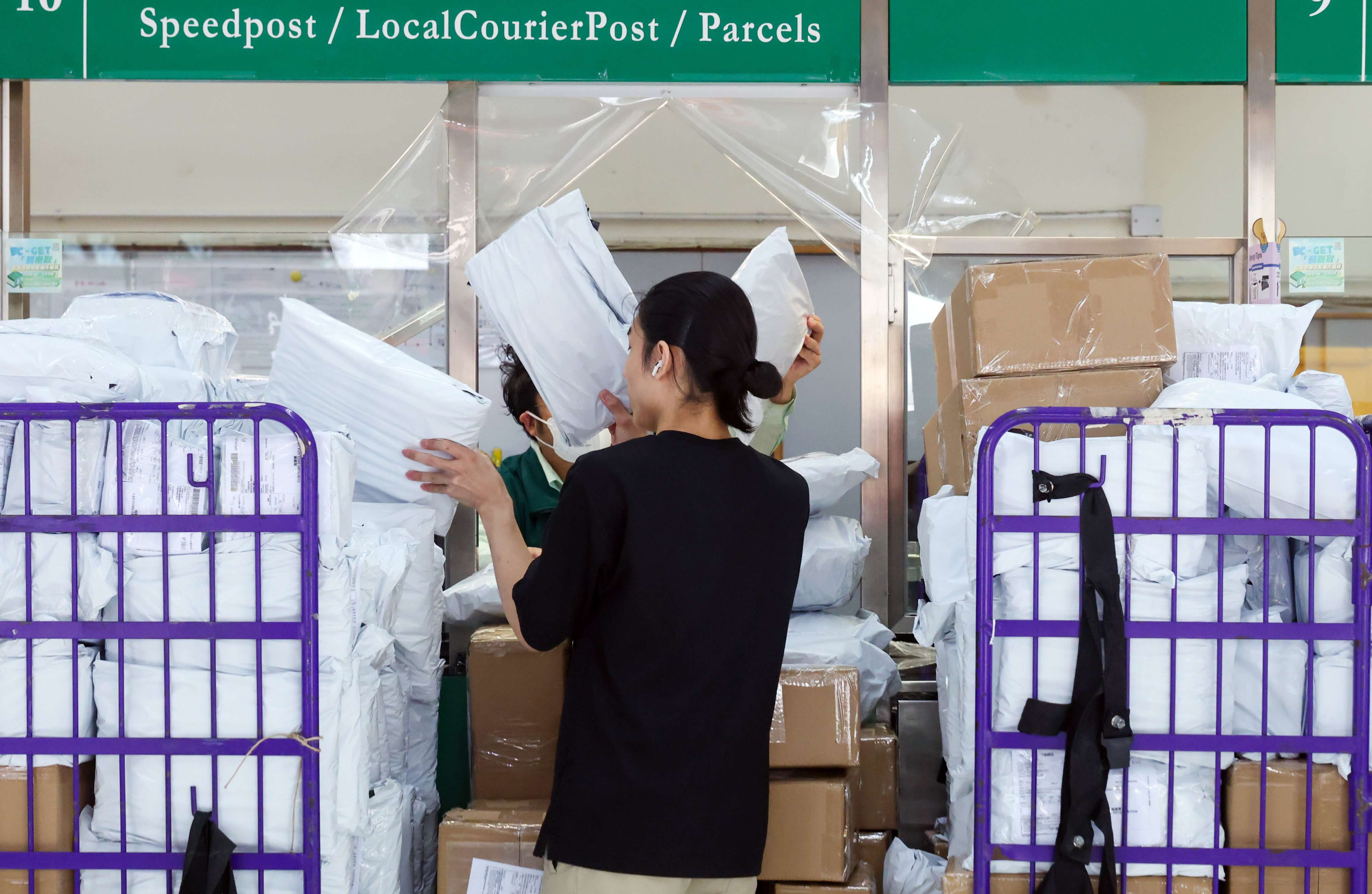 Tariffs on small parcels sent to the US from the mainland and Hong Kong have been increased to 120 per cent. Photo: Nora Tam