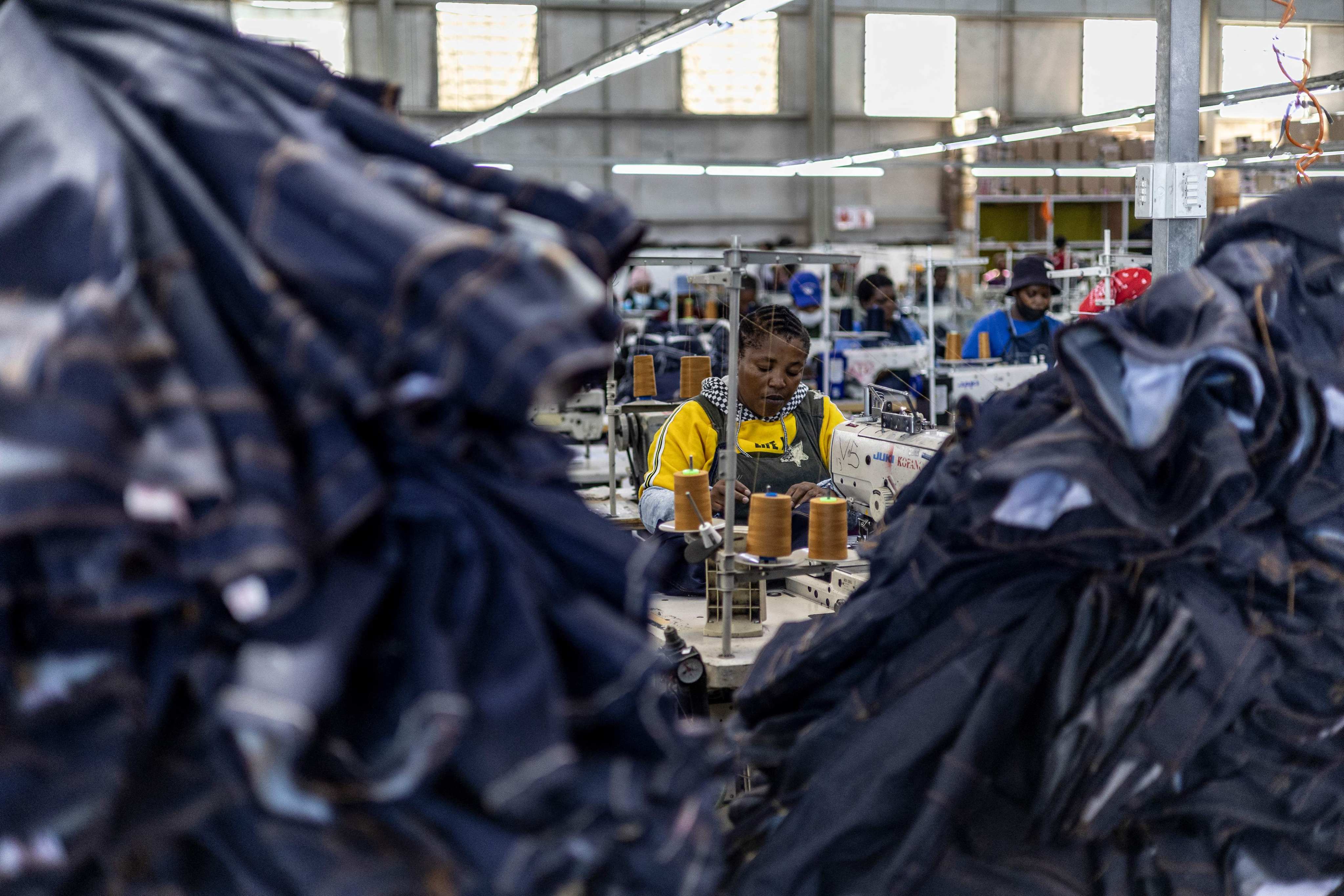 Workers use sewing machines at a textile factory in the small African kingdom of Lesotho. Photo: AFP