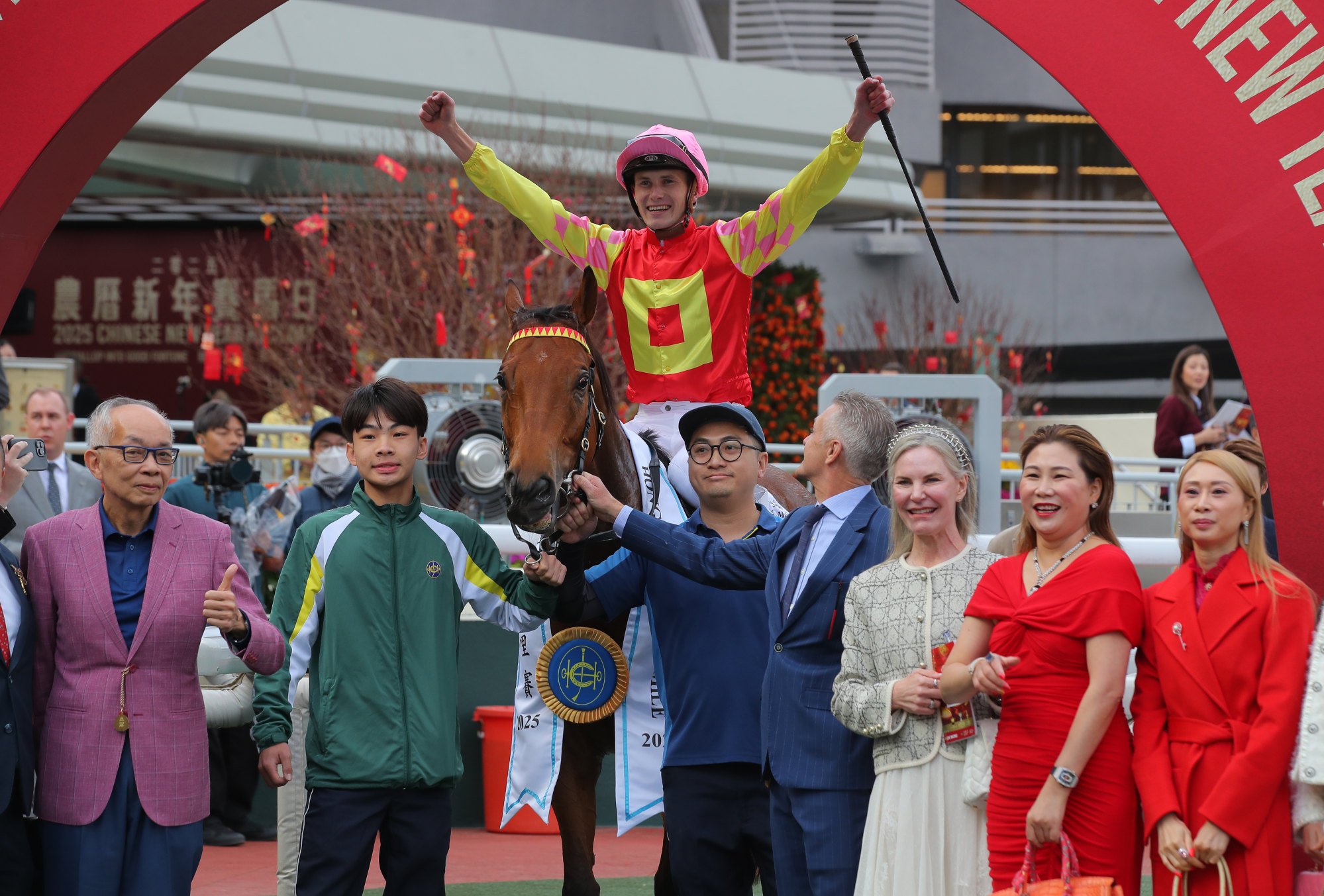 Jockey Luke Ferraris celebrates his Classic Mile win on My Wish.
