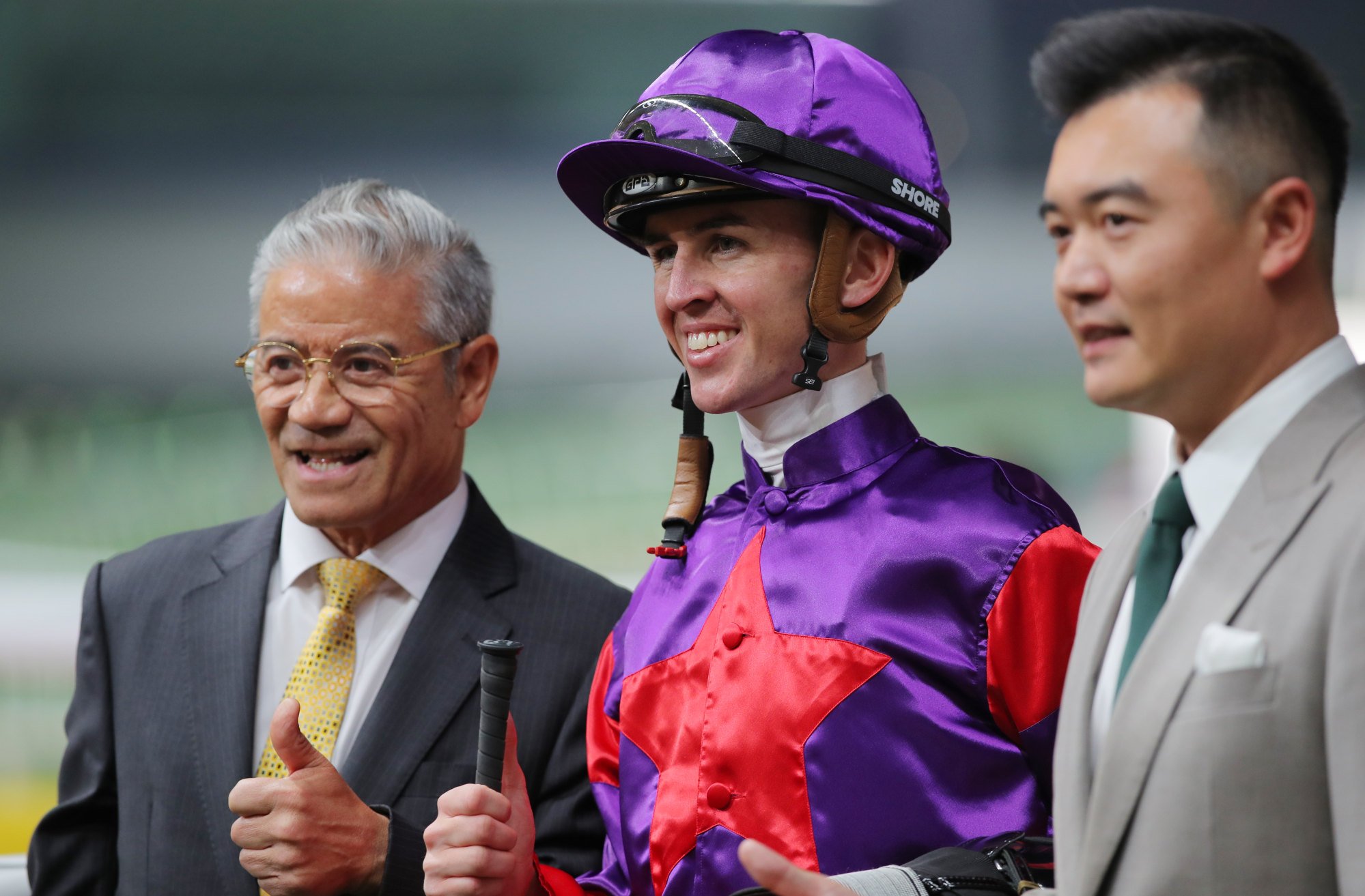 Trainer Tony Cruz (left) and jockey Ben Thompson celebrate Fallon’s recent triumph.