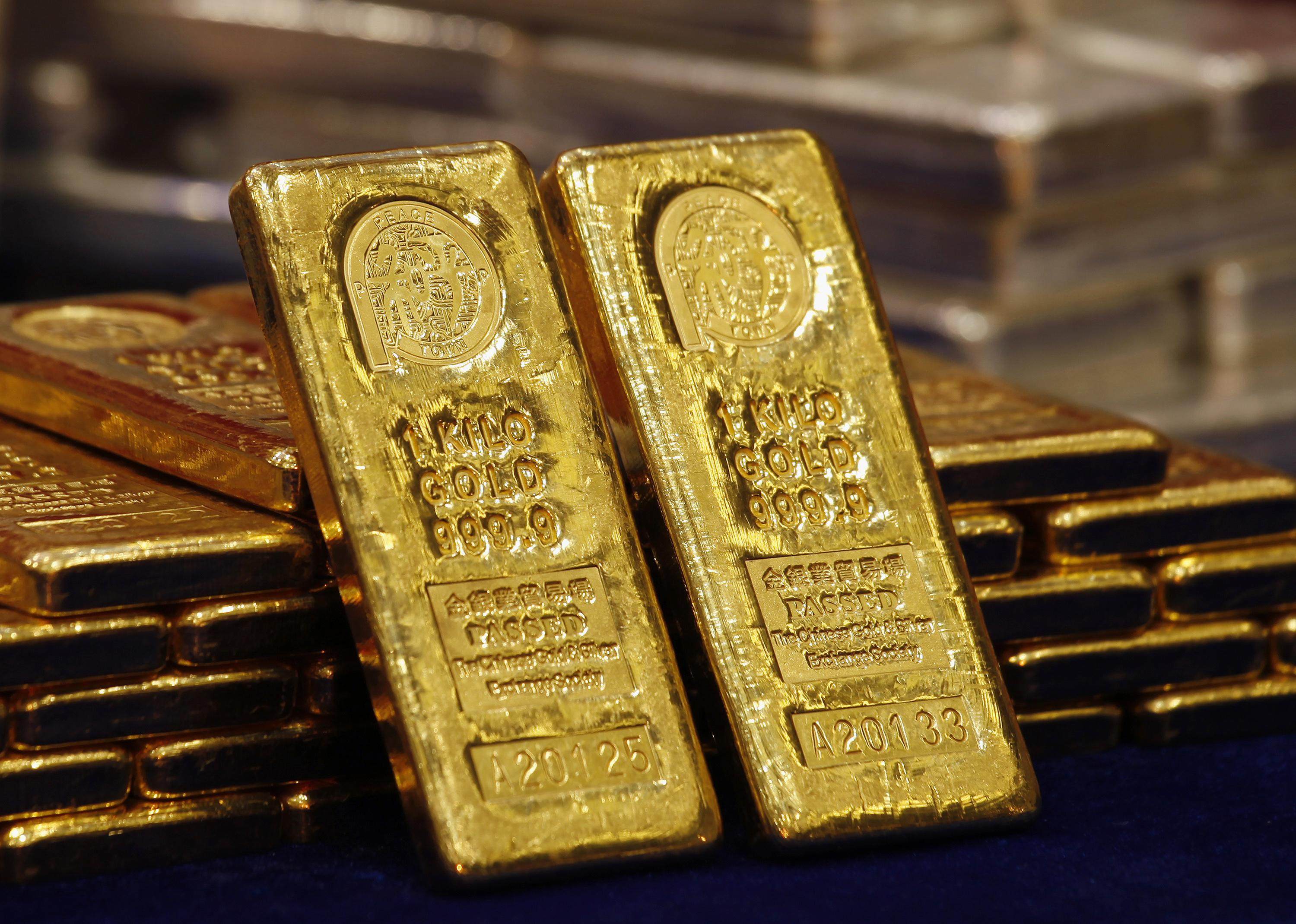 Gold bars weighing 1kg are displayed at the Chinese Gold and Silver Exchange Society in Hong Kong in this February 14, 2013, file photo. Photo: Reuters