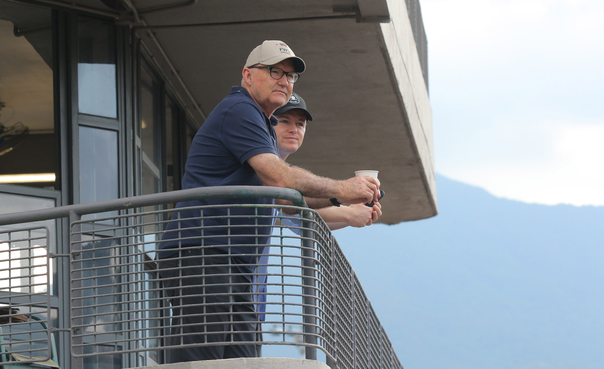 David Hayes and his son Ben at Sha Tin trackwork on Tuesday. Photo: Kenneth Chan