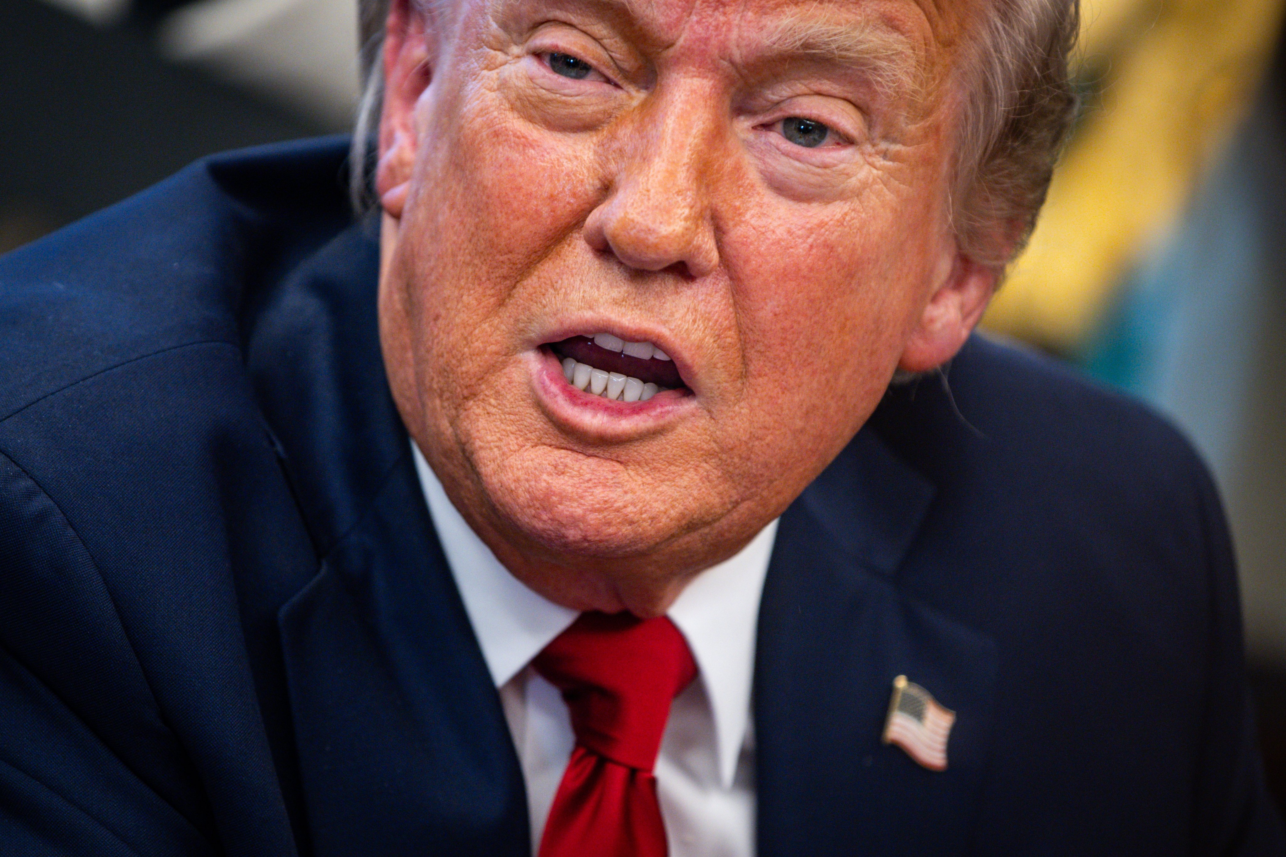 Donald Trump answers questions in the Oval Office. Photo: EPA-EFE