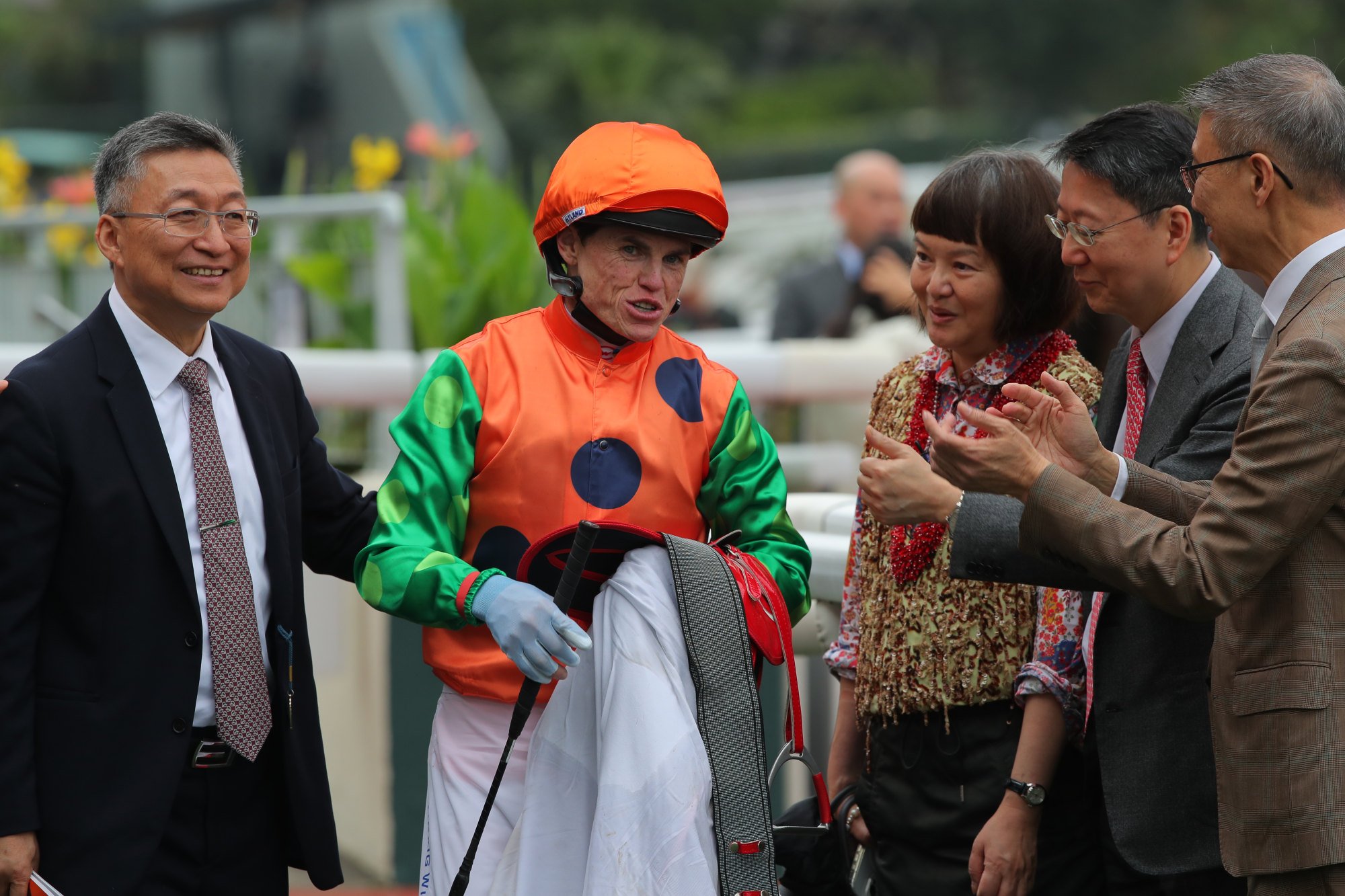 Trainer Francis Lui (left), jockey Craig Williams and connections of Invincible Shield celebrate.