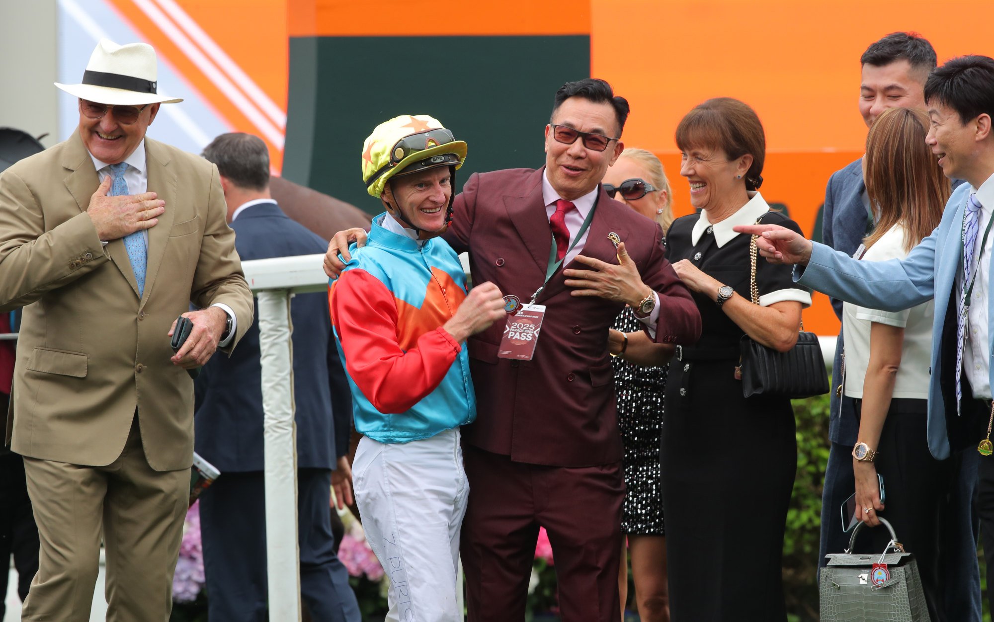 Trainer David Hayes (left), jockey Zac Purton and connections celebrate Ka Ying Rising’s latest Group One success.
