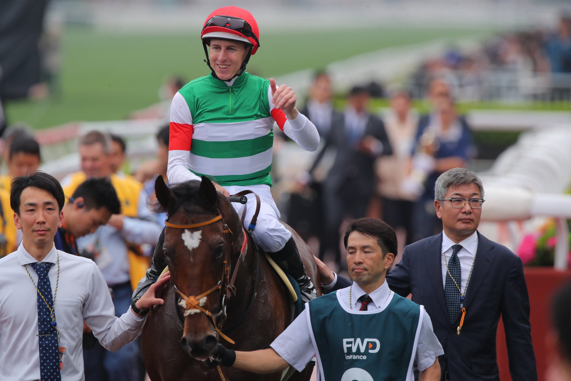 Damian Lane gives the thumbs up as he is led back in Tastiera. Damian Lane gives the thumbs up as he is led back in Tastiera.