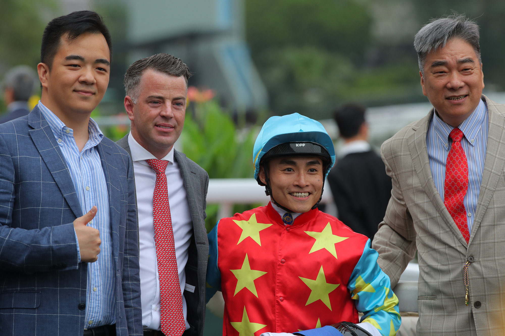 Trainer Jamie Richards (second from left), jockey Keith Yeung and connections of Goldentronicmighty.