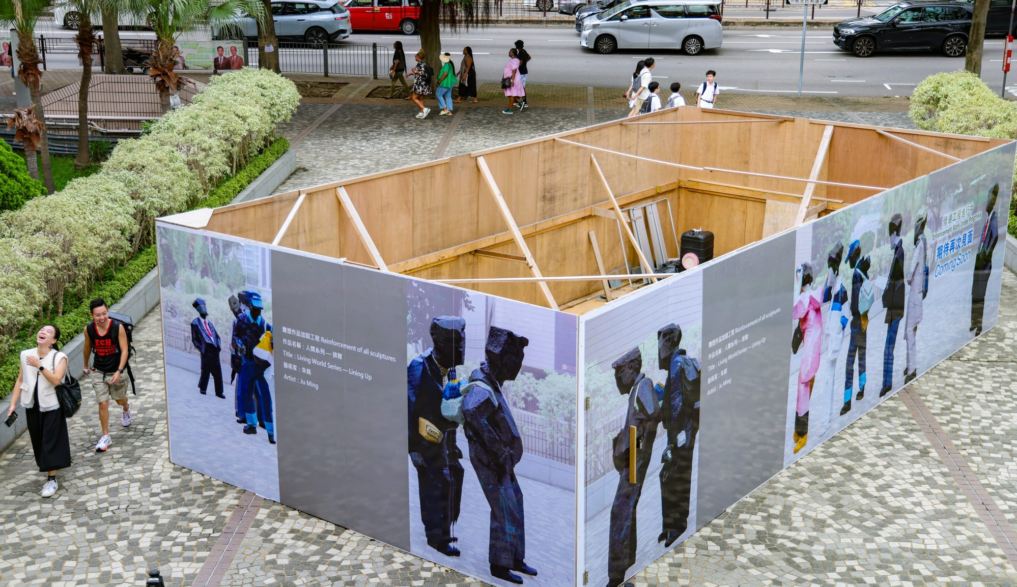 A repeating photo of the work had been wrapped around the hoarding where the work had stood. Photo: Jelly Tse A repeating photo of the work had been wrapped around the hoarding where the work had stood. Photo: Jelly Tse