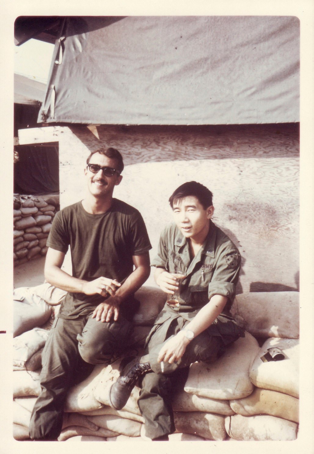 William Fong with a fellow soldier at a US military base in Vietnam in 1969. File photo: William Fong via AP