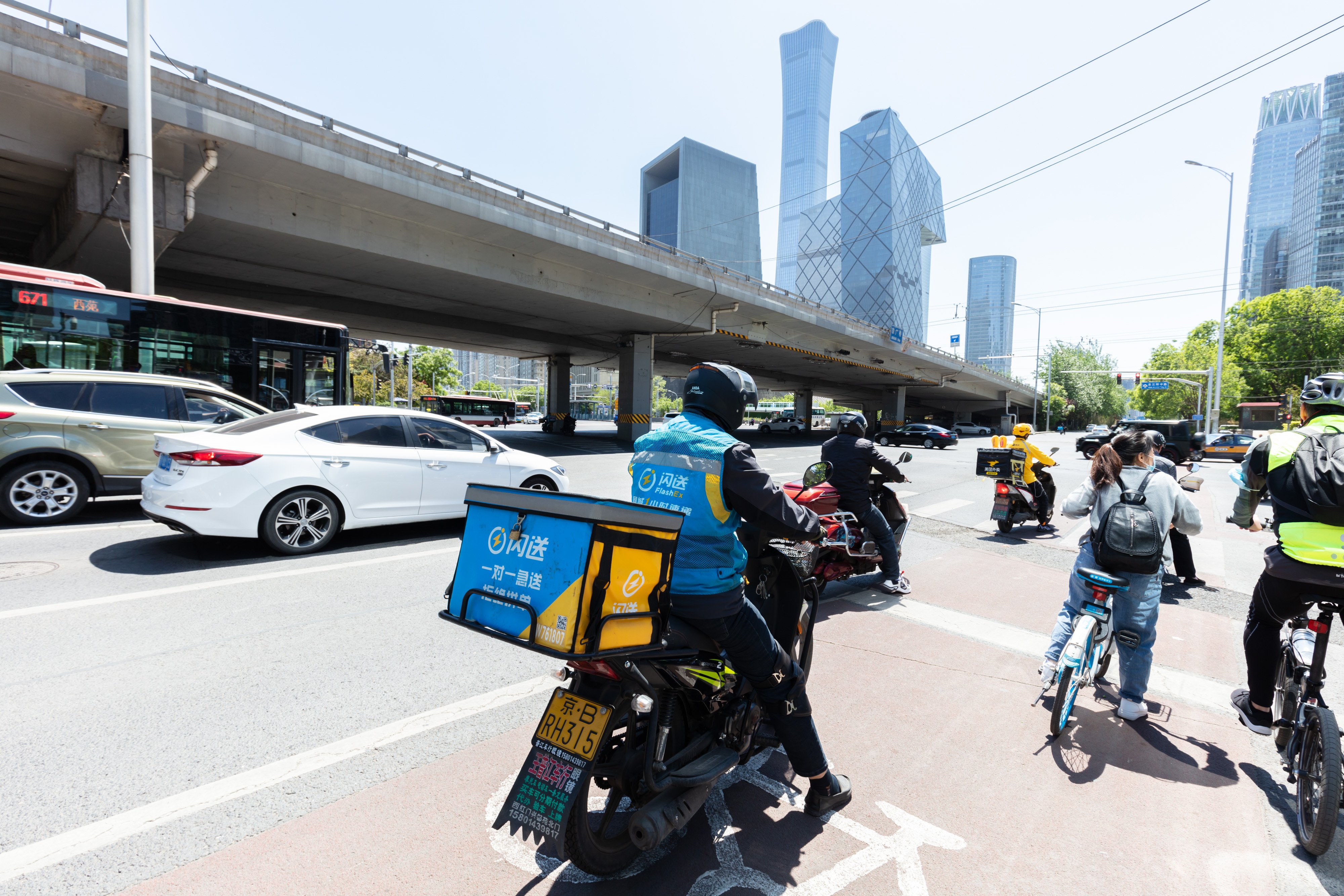 An Ele.me food delivery rider on the streets of Beijing on May 4, 2021. Photo: Shutterstock