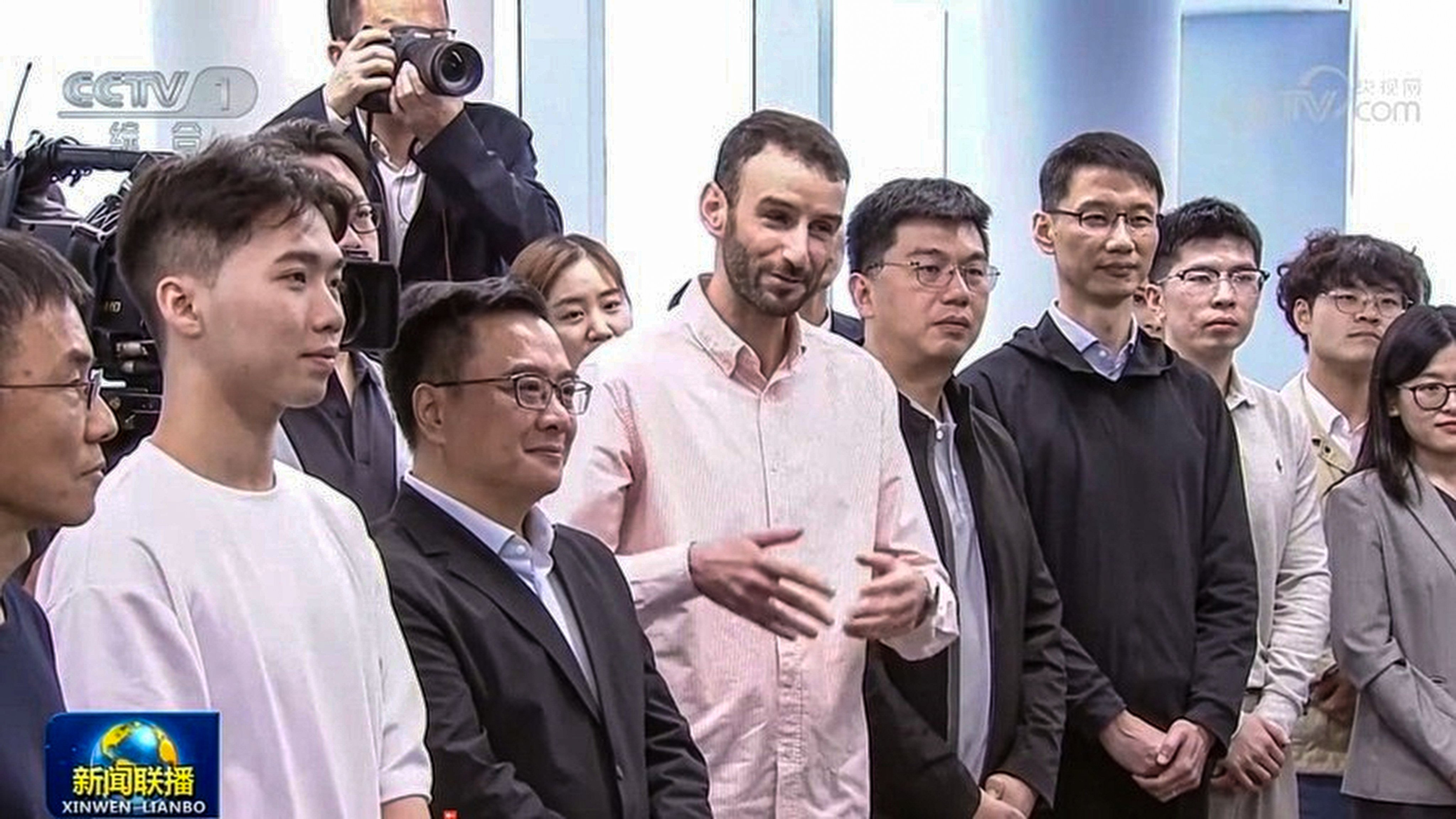 Hamza Boukili, a mathematics teacher at Shanghai Jiao Tong University, was part of the group on hand during an inspection tour by President Xi Jinping on Tuesday. Photo: CCTV