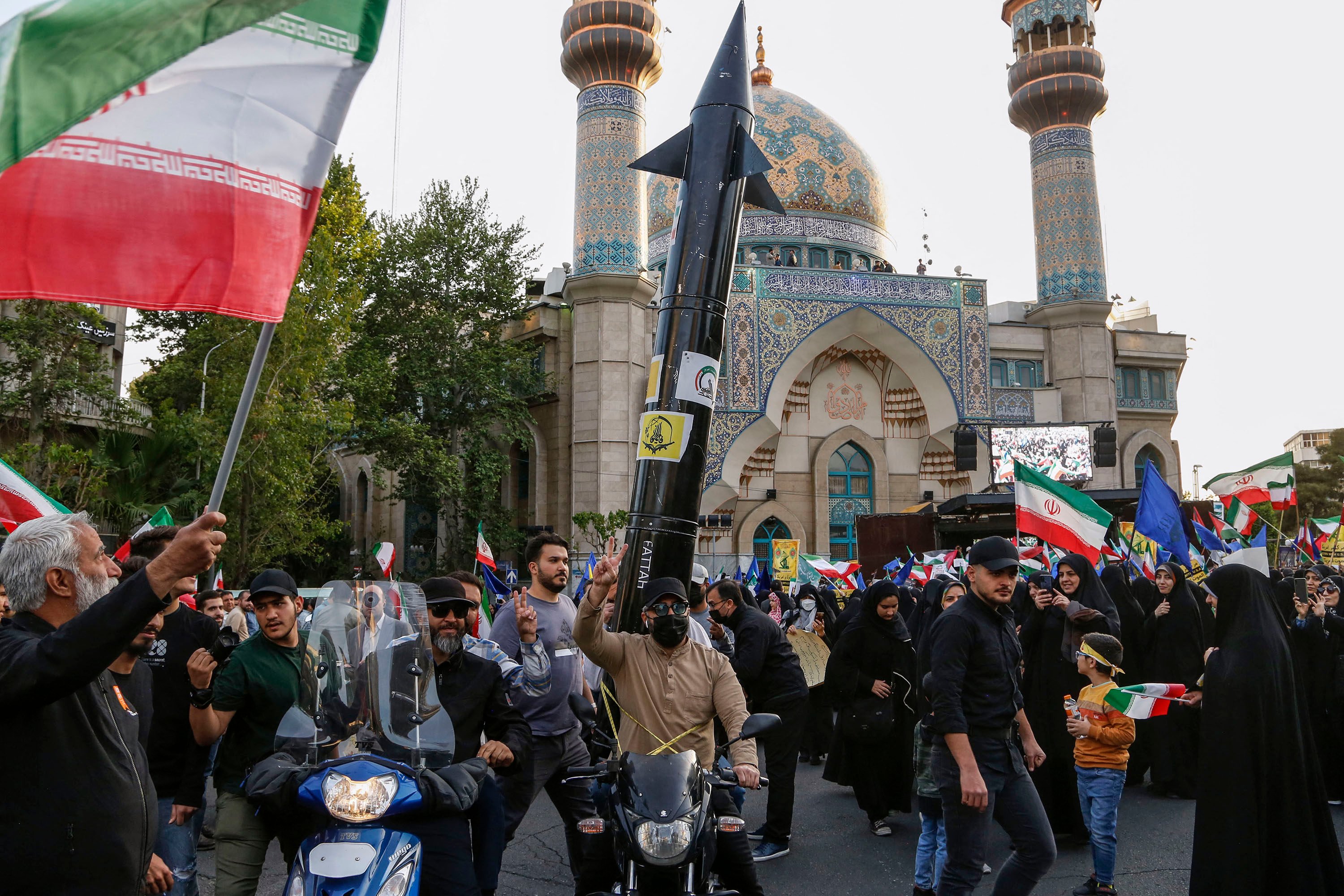 Iranians celebrate a missile and drone attack on Israel, on April 15, 2024, at Palestine square in central Tehran. Photo: TNS