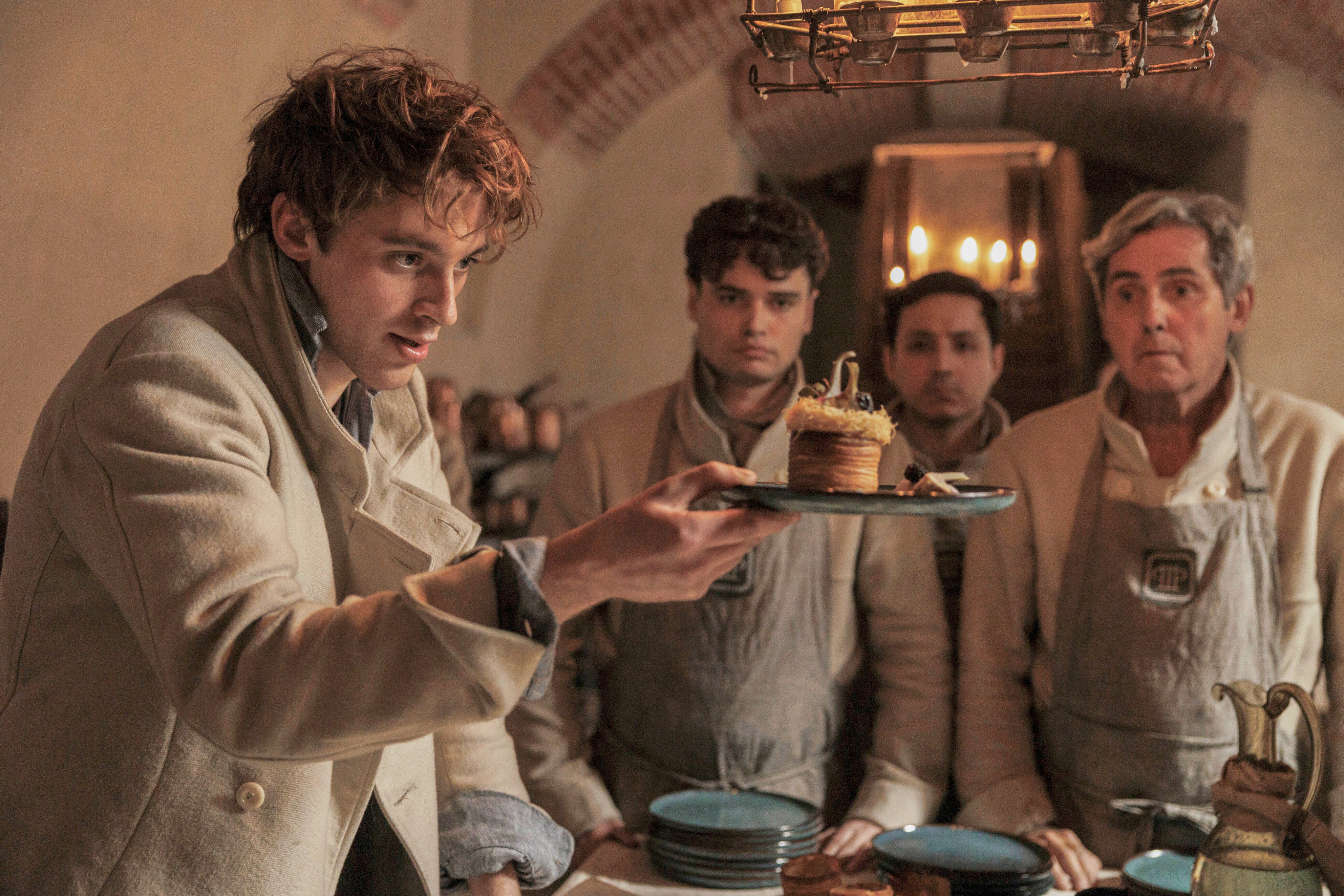 Benjamin Voisin in a scene from Apple TV+ show Carême. Antonin Carême went from poor kitchen boy to a leading French chef in his time. Photo: Apple TV+ via AP