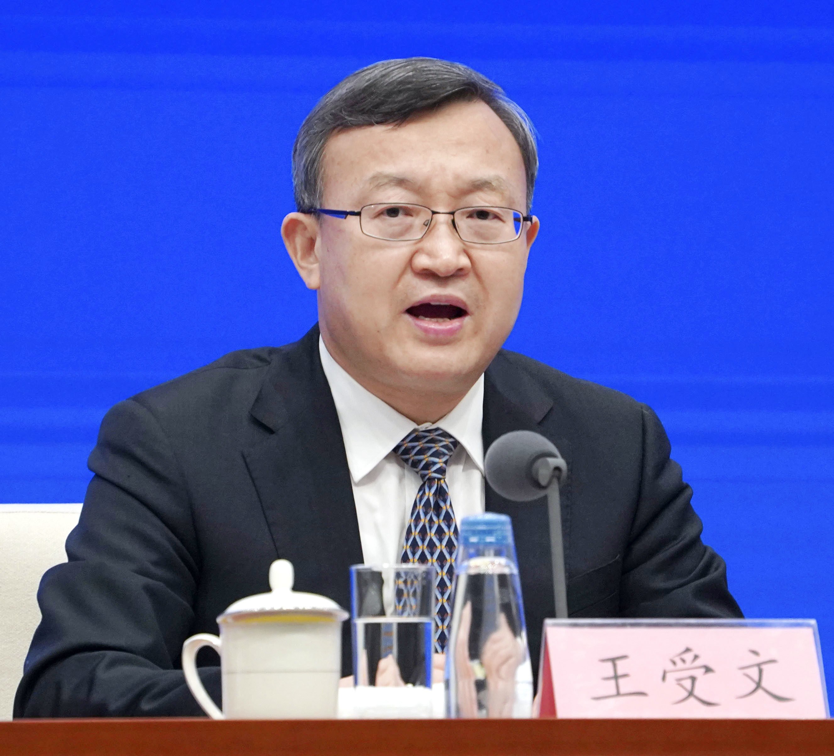 It remains unclear why Wang Shouwen, who is six years away from the retirement age for officials of his rank, has been transferred from his high-stakes position at the Ministry of Commerce. Photo: Kyodo