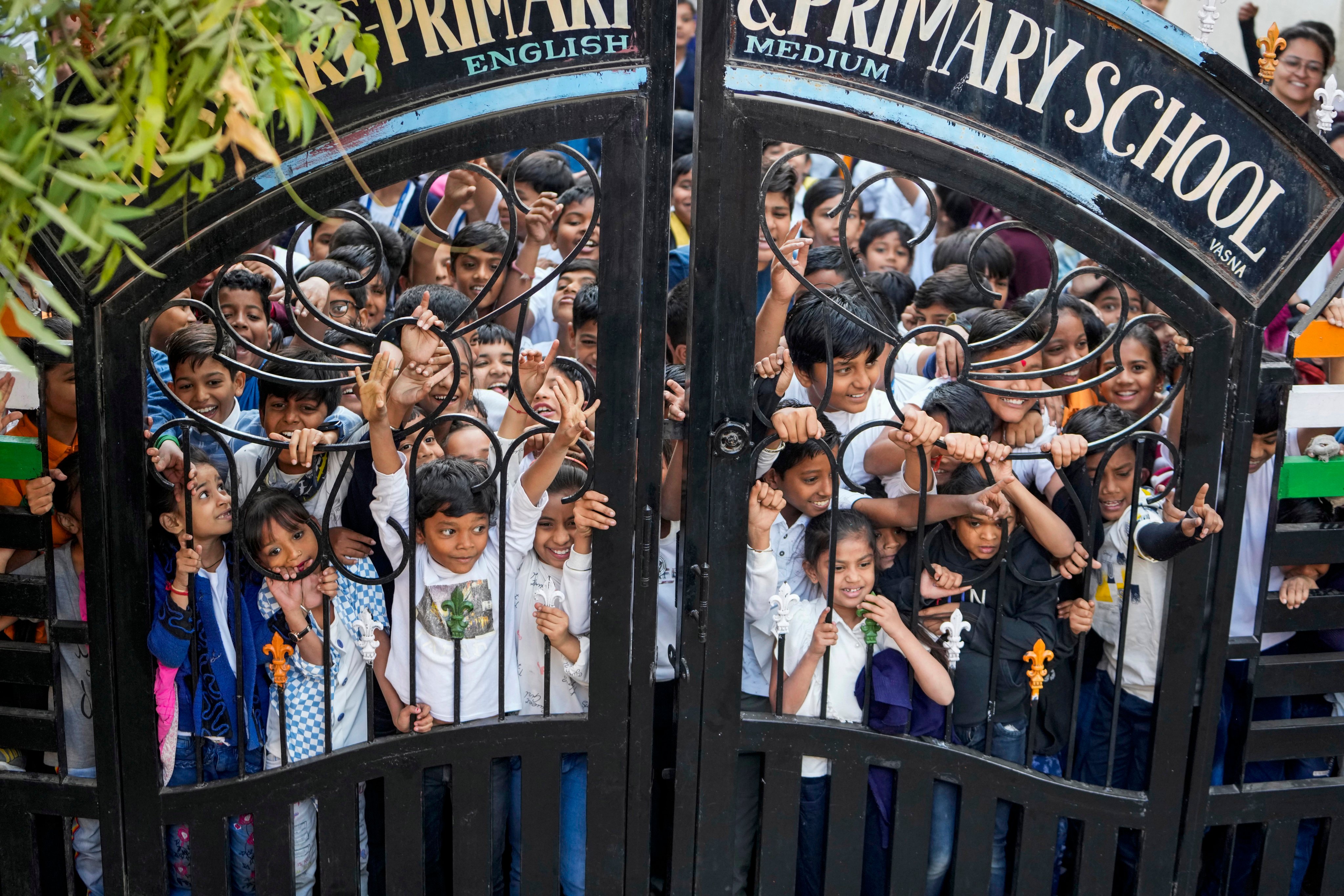 Free lunches are offered to millions of children in government schools throughout India, seen by authorities as a way to encourage children to continue their education. Photo: AP