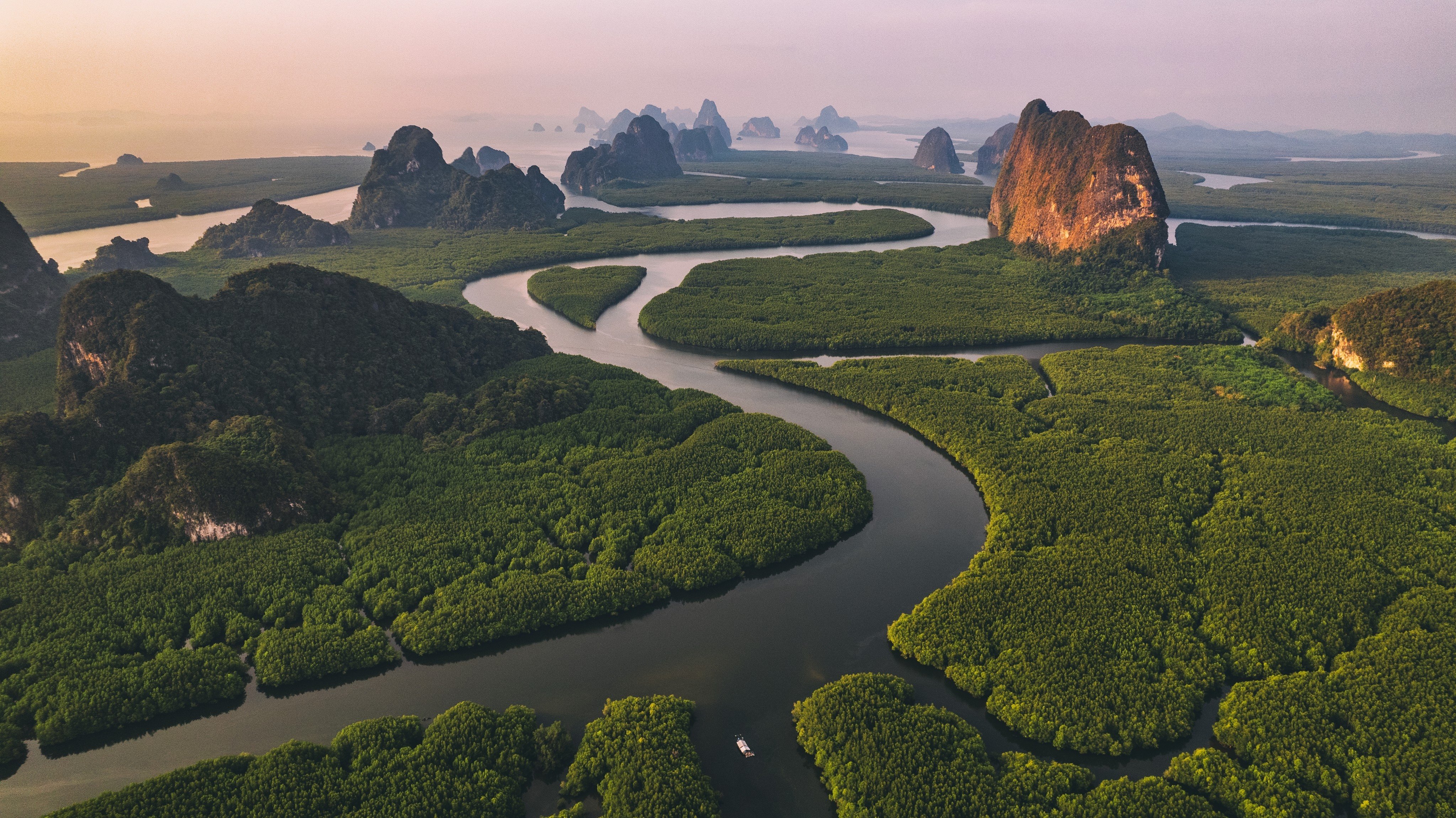 Soaking up sights of Phang Nga Bay, Thailand, from sky, sea and land. Photo: Shutterstock