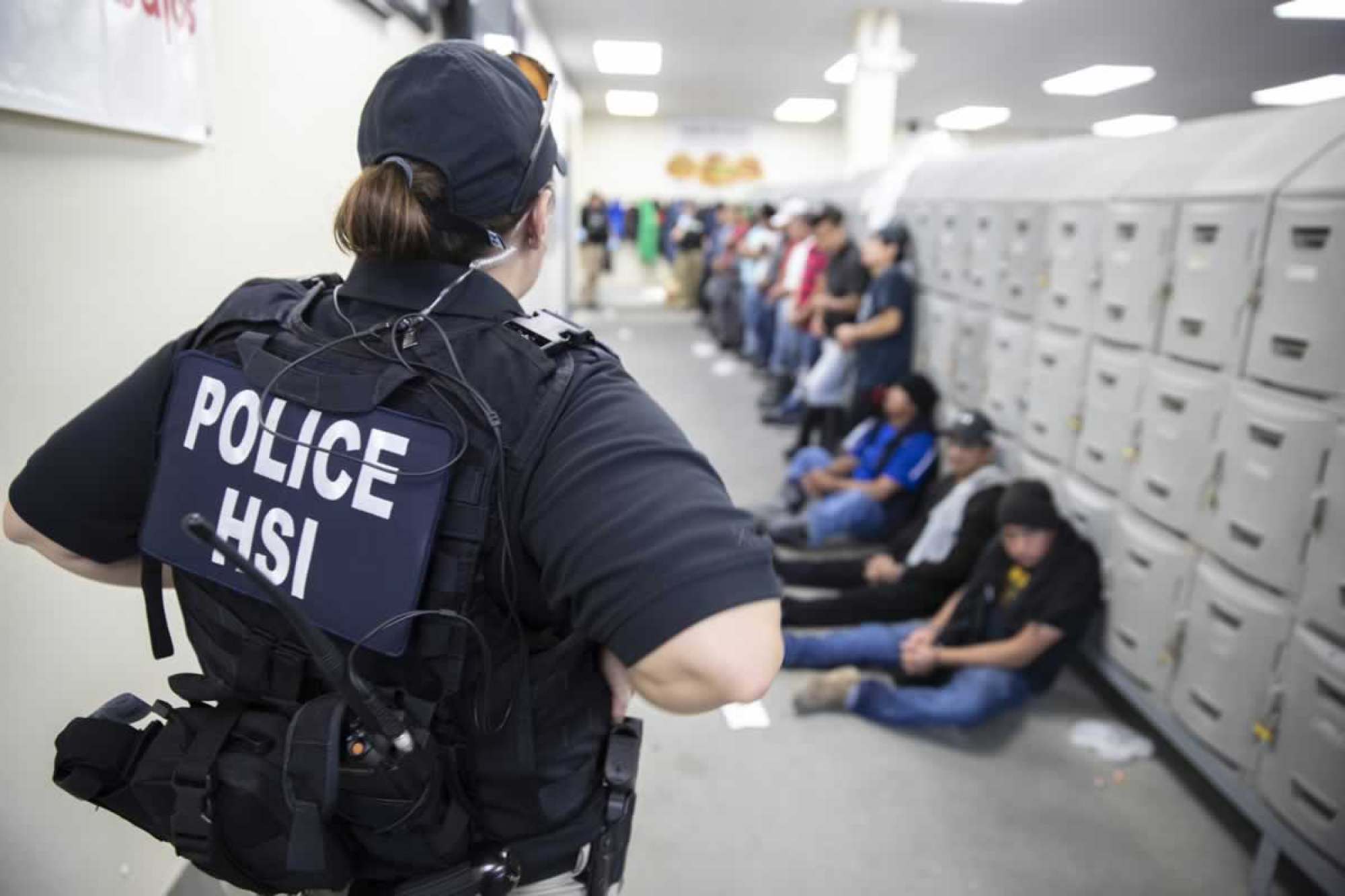 A Homeland Security Investigations officer guards suspected illegal aliens in 2019. Photo: AFP A Homeland Security Investigations officer guards suspected illegal aliens in 2019. Photo: AFP