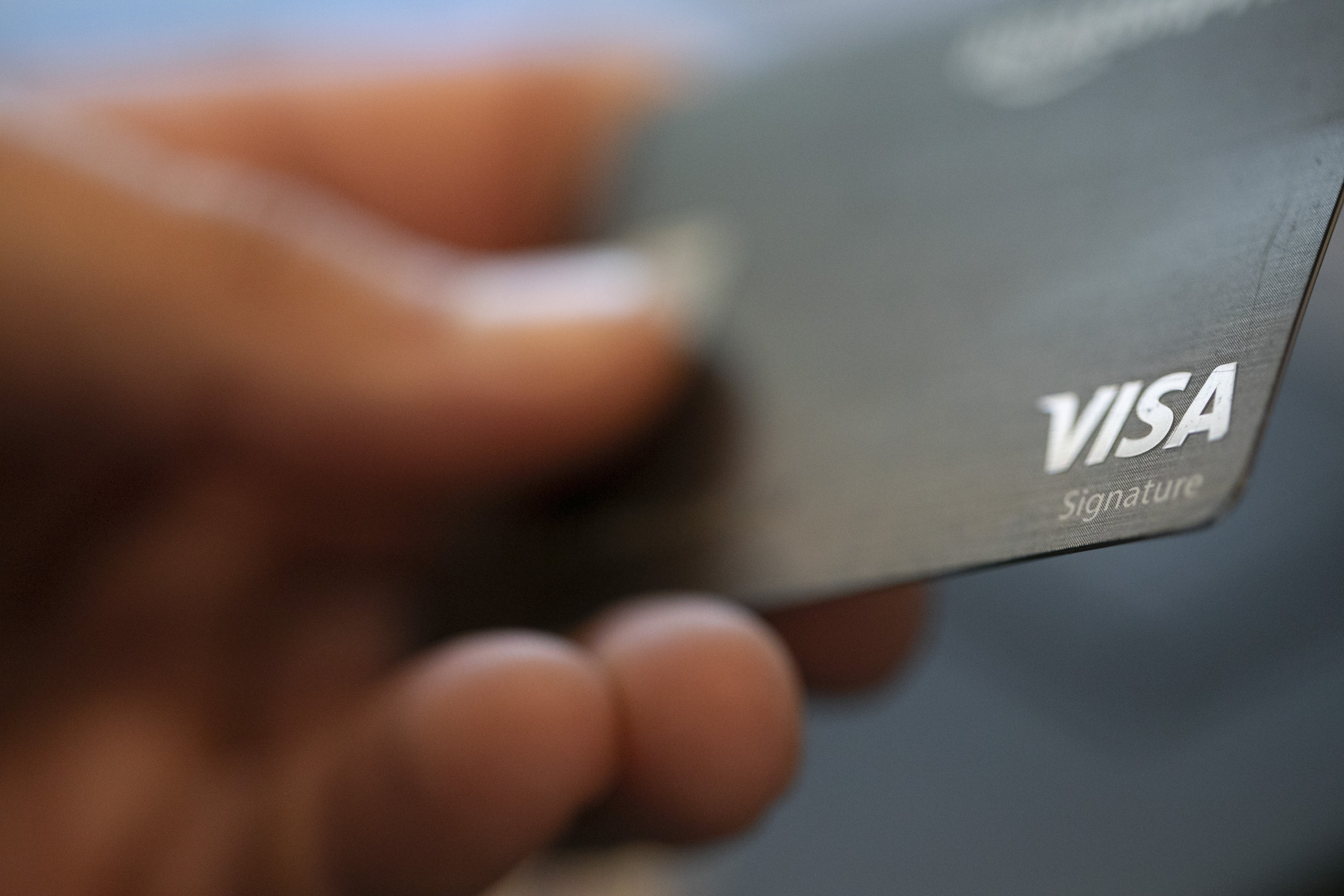 Visa is working with tech developers to create an AI that will search for good you want, then buy them with your credit card. Photo: AP