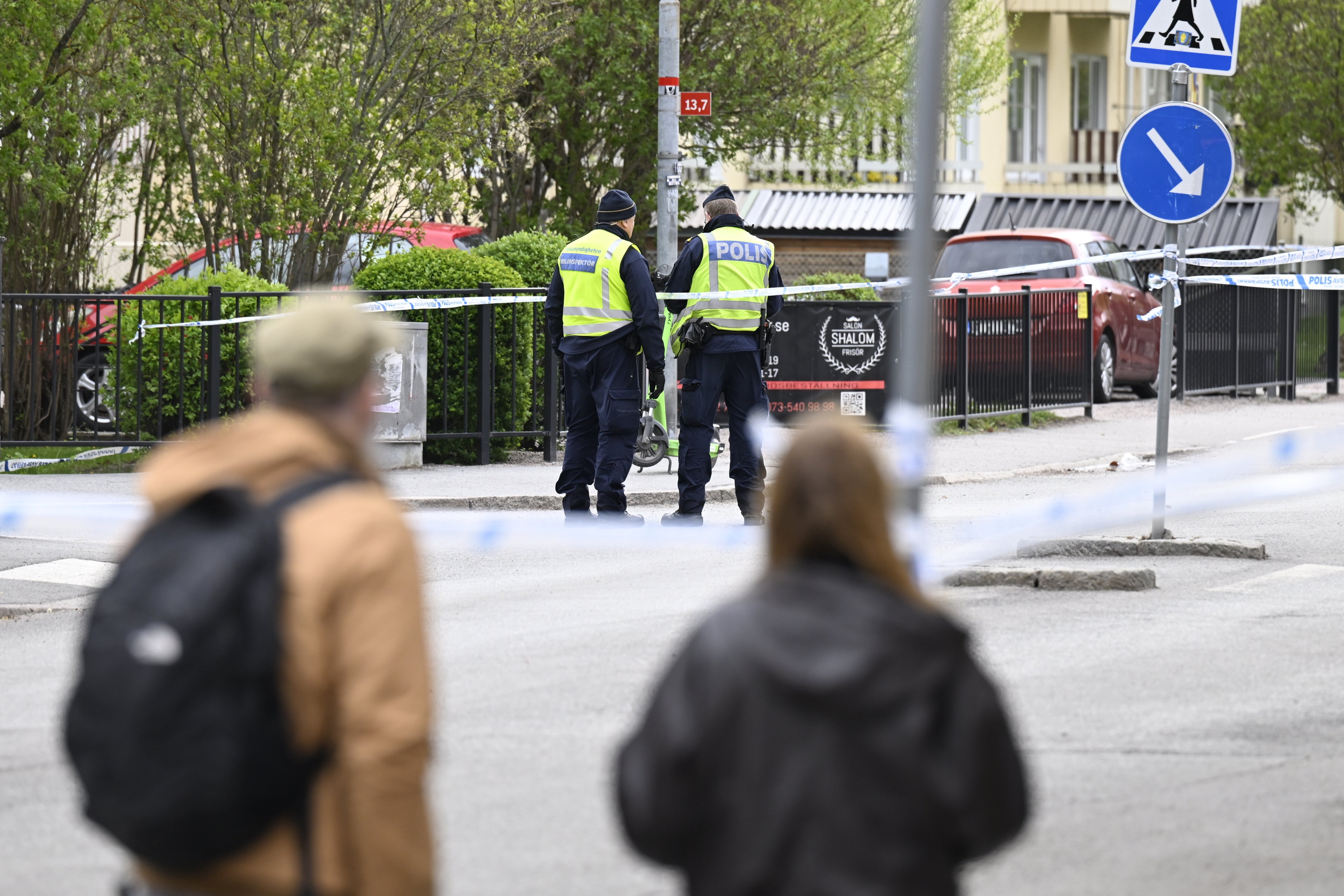 Police at the scene on Wednesday, a day after after a shooting at Vaksala Square in central Uppsala, Sweden. Photo: EPA-EFE