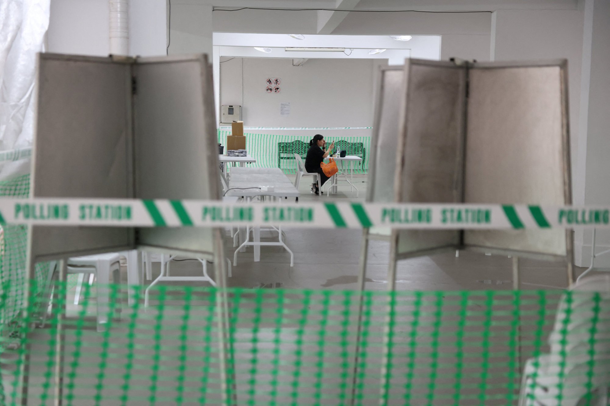 A polling station is set up at a housing estate void deck, ahead of the general election in Singapore. Photo: Reuters A polling station is set up at a housing estate void deck, ahead of the general election in Singapore. Photo: Reuters