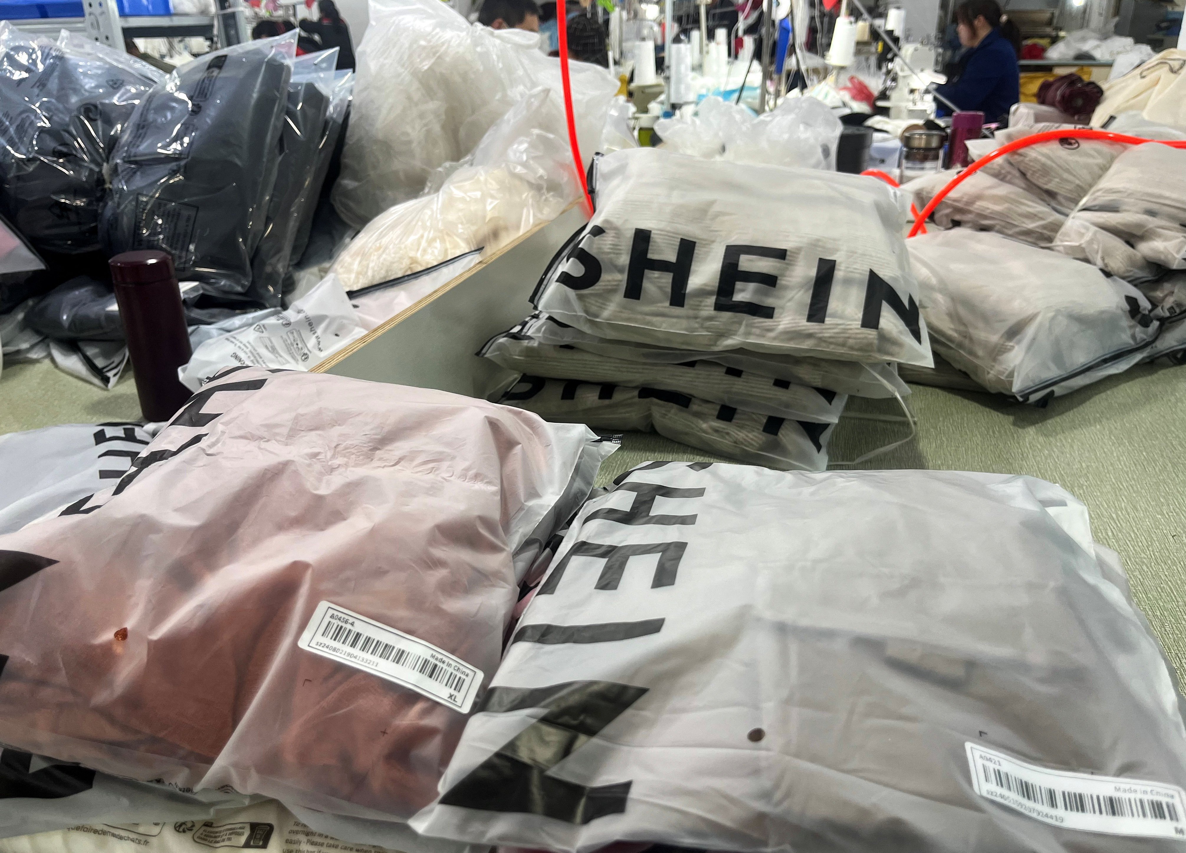 Packs of clothing are strewn about a garment factory for Shein, a Chinese online retailer, in Guangzhou, Guangdong province, on Thursday. Photo: Reuters