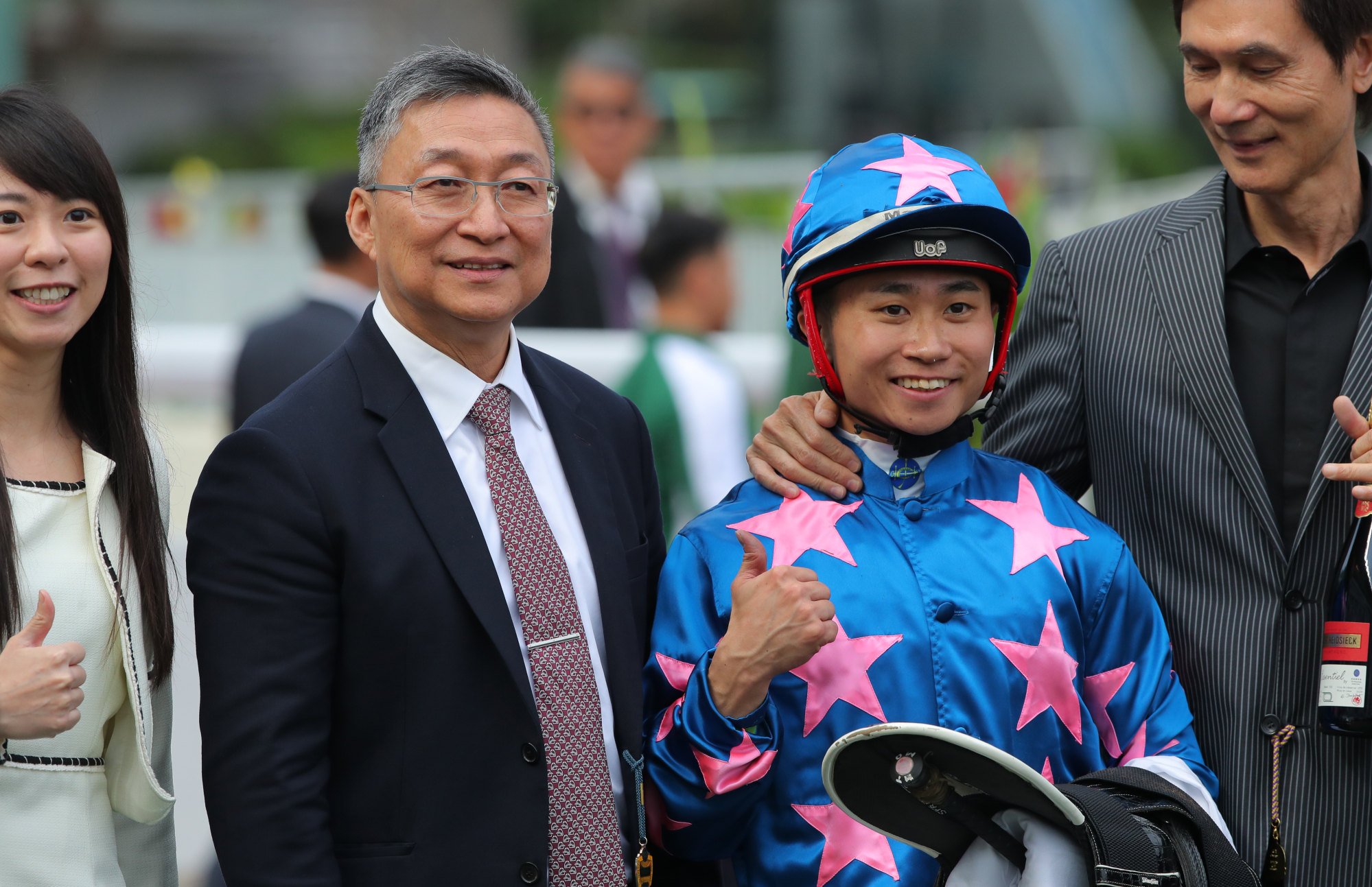 Trainer Francis Lui and jockey Dylan Mo celebrate Winning Wing’s victory. Trainer Francis Lui and jockey Dylan Mo celebrate Winning Wing’s victory.