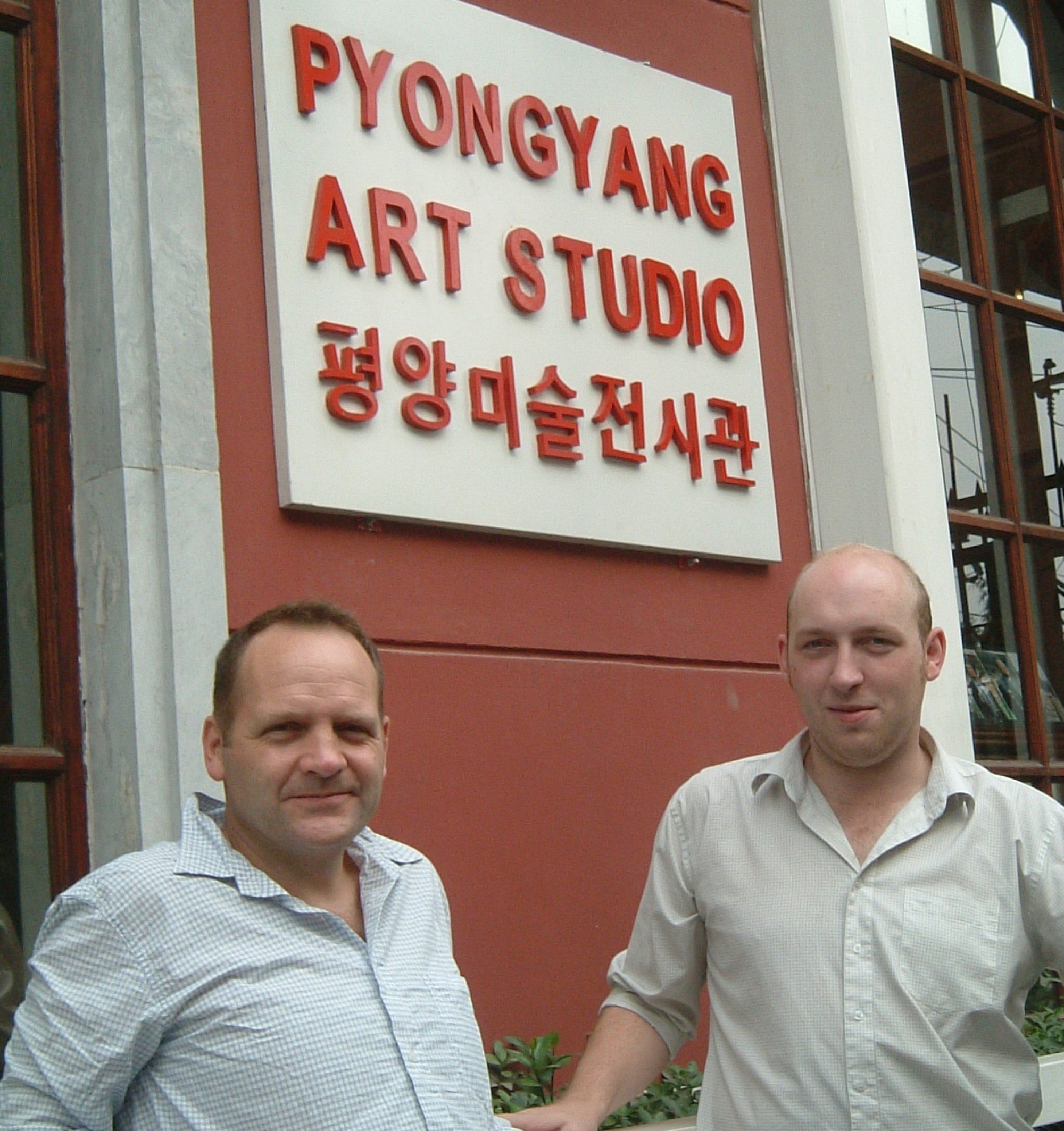 Nick Bonner (left) pictured with his partner Simon Cockerell outside Pyongyang Art Studio. Photo: Benjamin Robertson Nick Bonner (left) pictured with his partner Simon Cockerell outside Pyongyang Art Studio. Photo: Benjamin Robertson