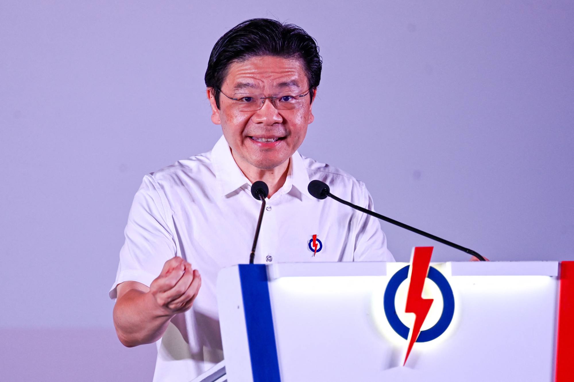 Singapore’s Prime Minister addresses supporters during an election rally in Singapore on Wednesday. Photo: AFP Singapore’s Prime Minister addresses supporters during an election rally in Singapore on Wednesday. Photo: AFP