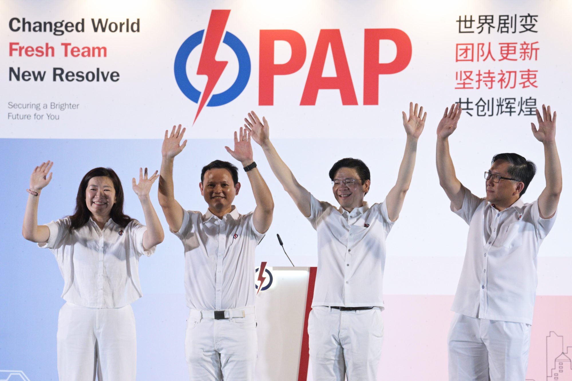 Singapore’s Prime Minister Lawrence Wong (second from right) waves to supporters of the People’s Action Party after his side secured a decisive win in the election. Photo: Xinhua Singapore’s Prime Minister Lawrence Wong (second from right) waves to supporters of the People’s Action Party after his side secured a decisive win in the election. Photo: Xinhua