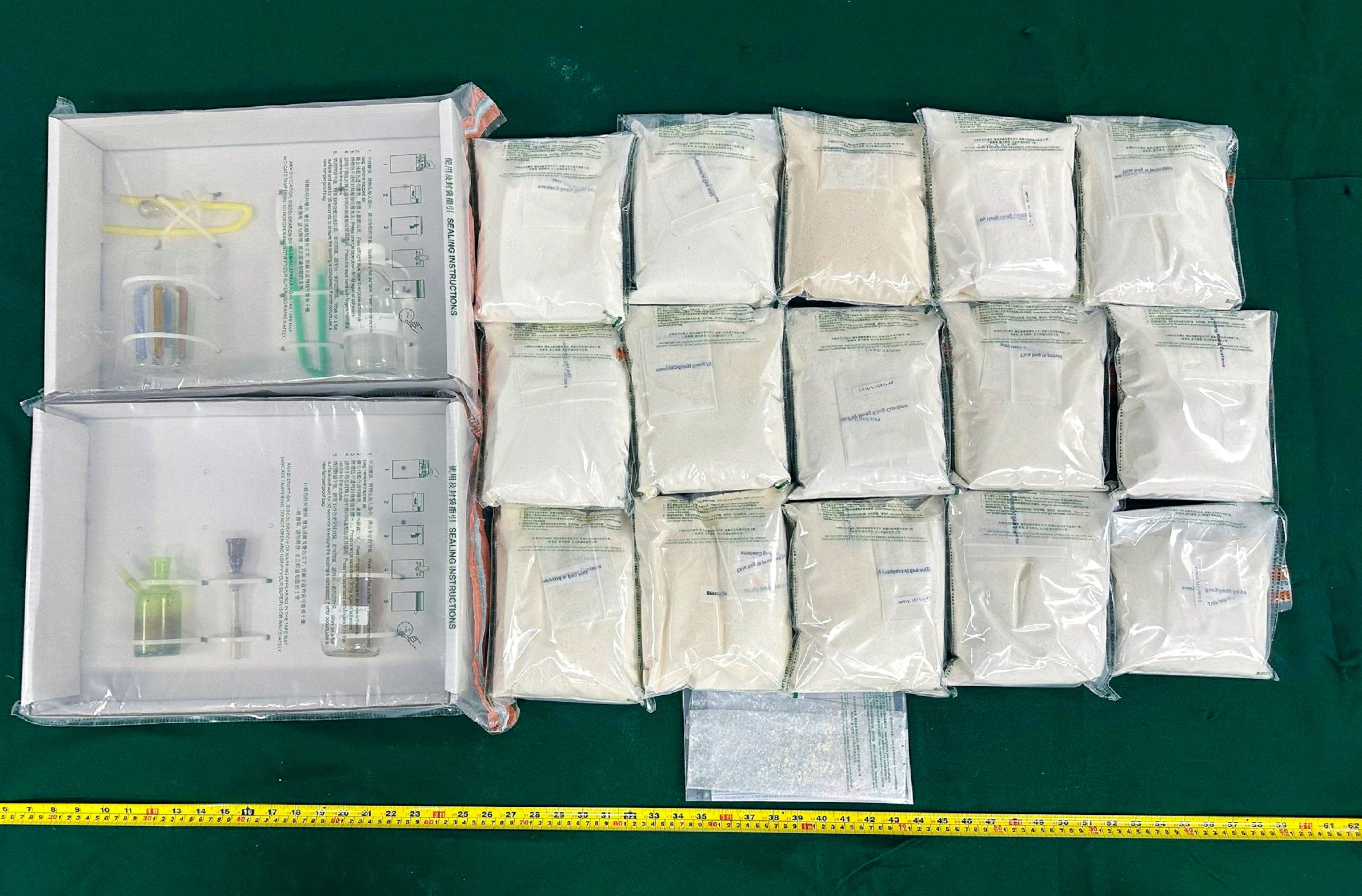 Hong Kong customs arrested a man with about 15kg of suspected etomidate in food packages. Photo: Handout