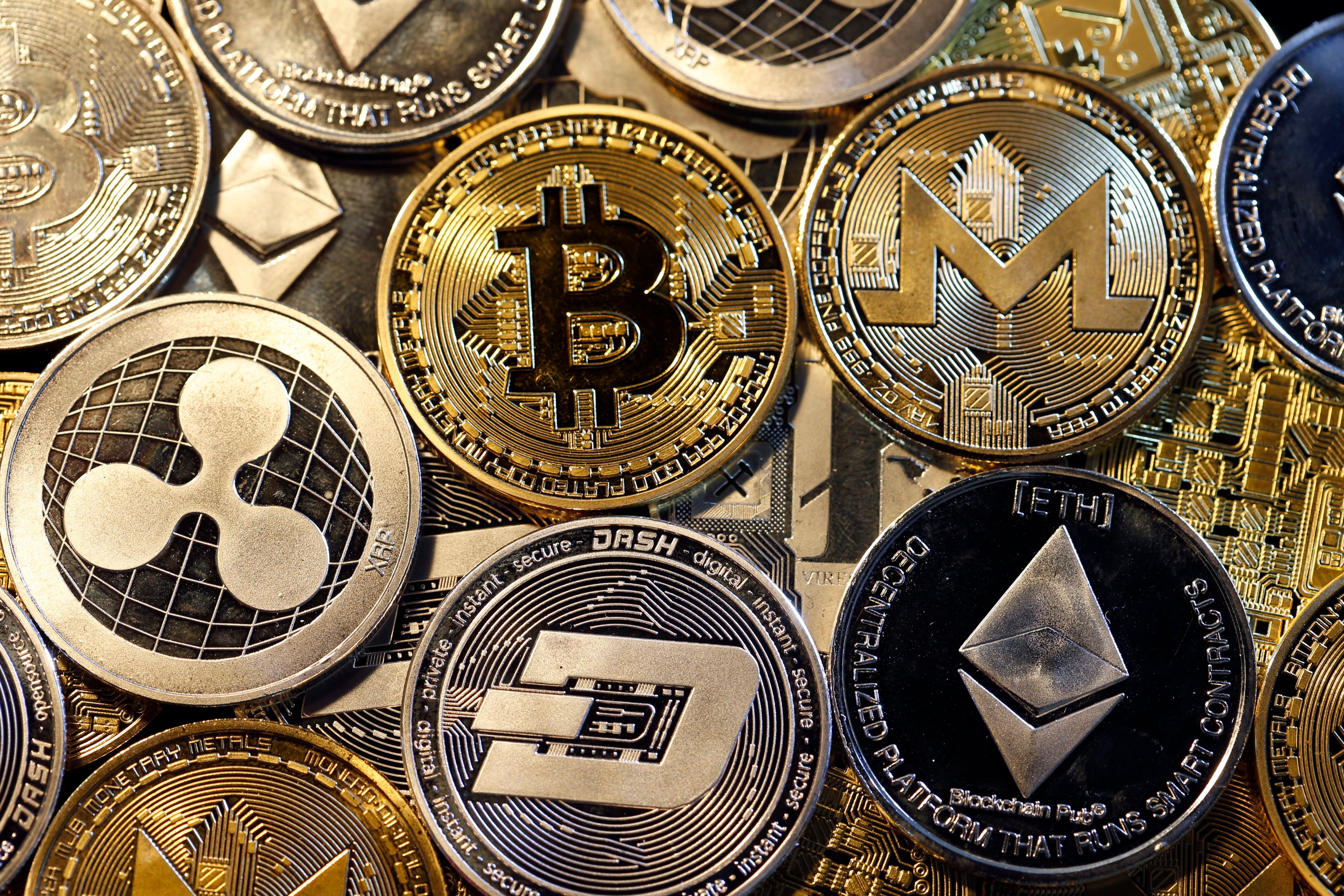 Physical representations of digital cryptocurrencies, displayed in February 2018 in Paris, France. Photo: Getty Image