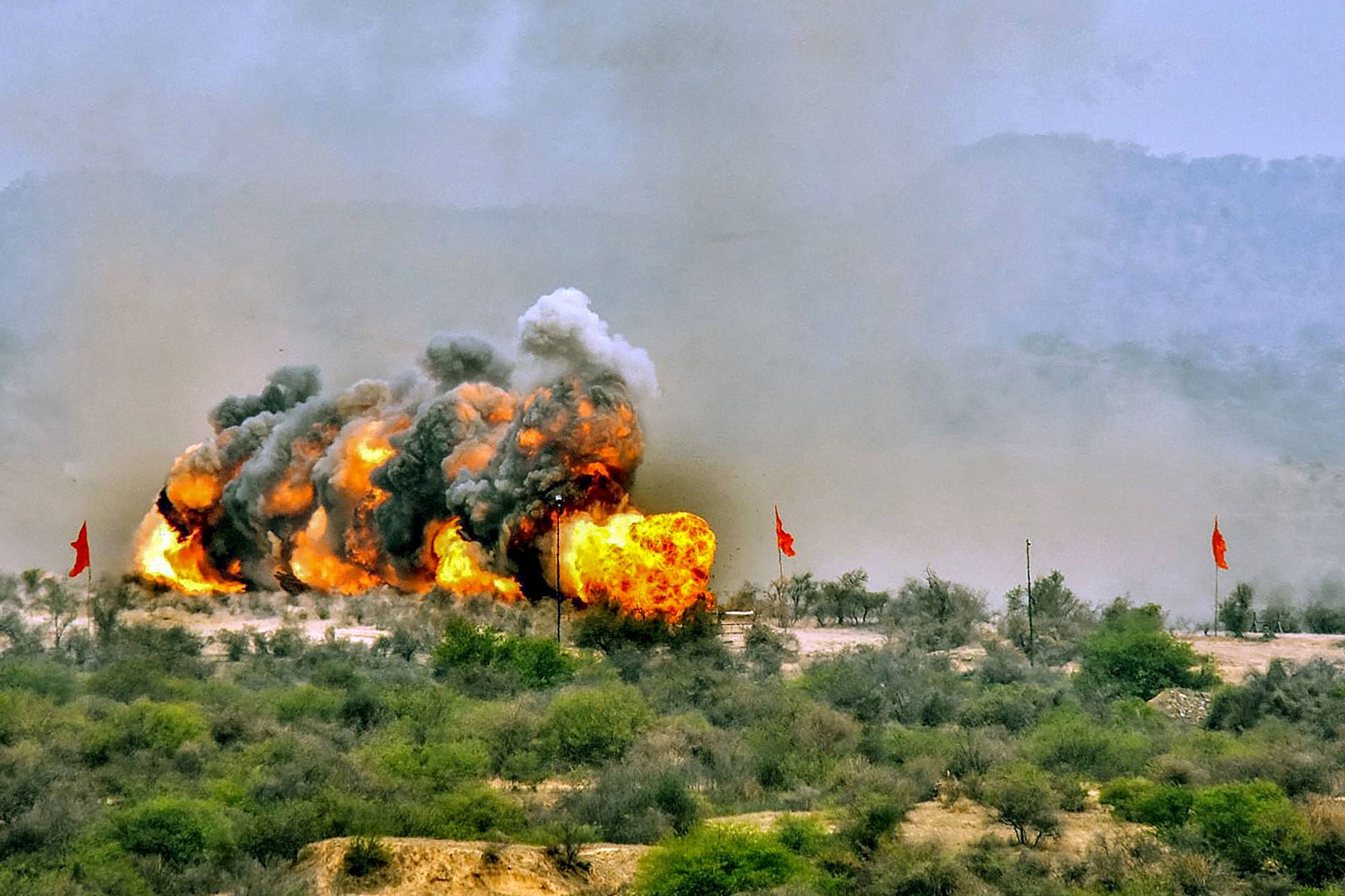 An explosion on the ground during a Pakistan Army military exercise on Thursday. Photo: AFP An explosion on the ground during a Pakistan Army military exercise on Thursday. Photo: AFP