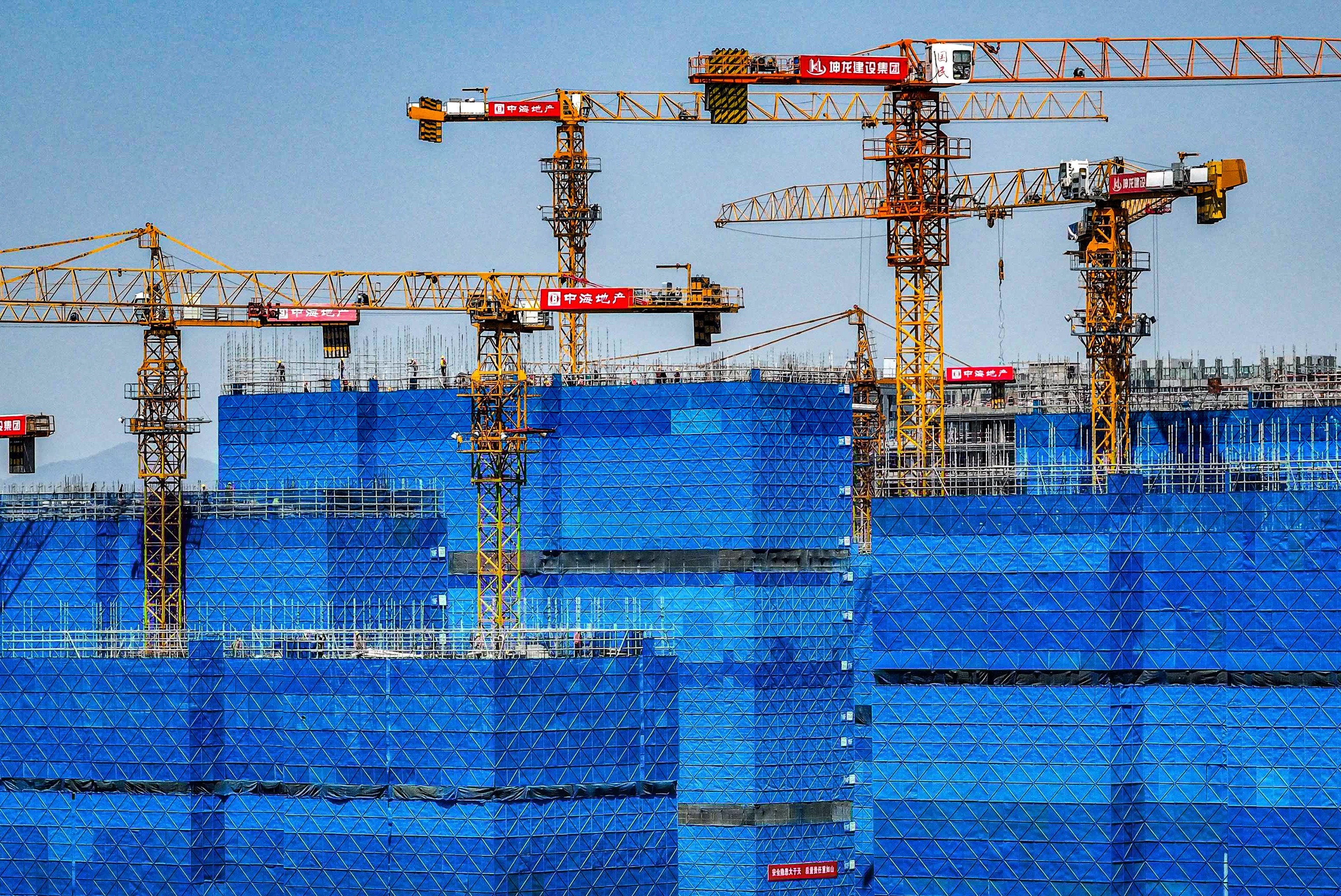 Cranes on a residential site in Nanjing. Photo: AFP