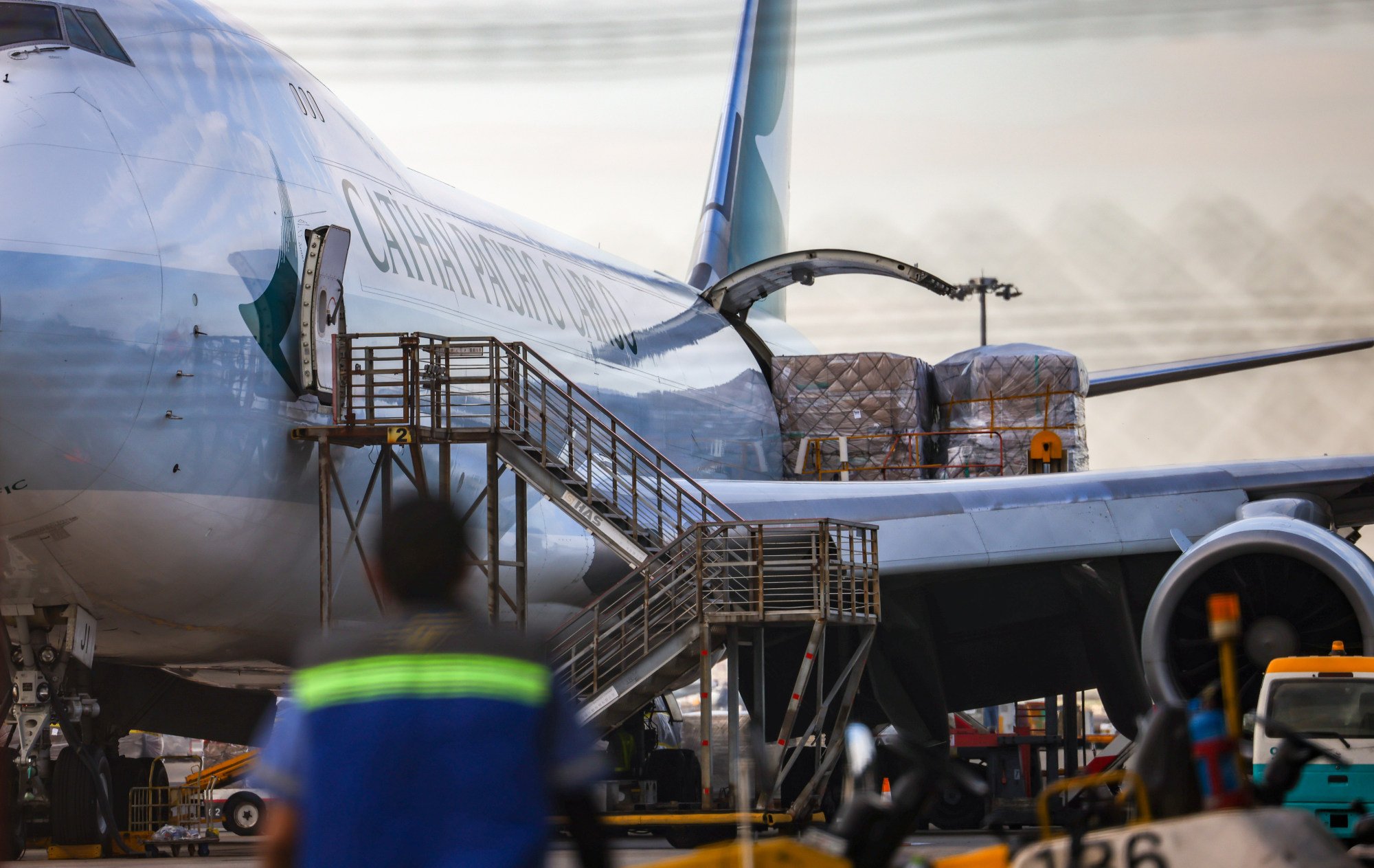A Cathay Pacific Airways cargo plane at Hong Kong International Airport. Analysts said they expected tariffs would dampen exports and re-exports to the US from early April. Photo: Dickson Lee A Cathay Pacific Airways cargo plane at Hong Kong International Airport. Analysts said they expected tariffs would dampen exports and re-exports to the US from early April. Photo: Dickson Lee
