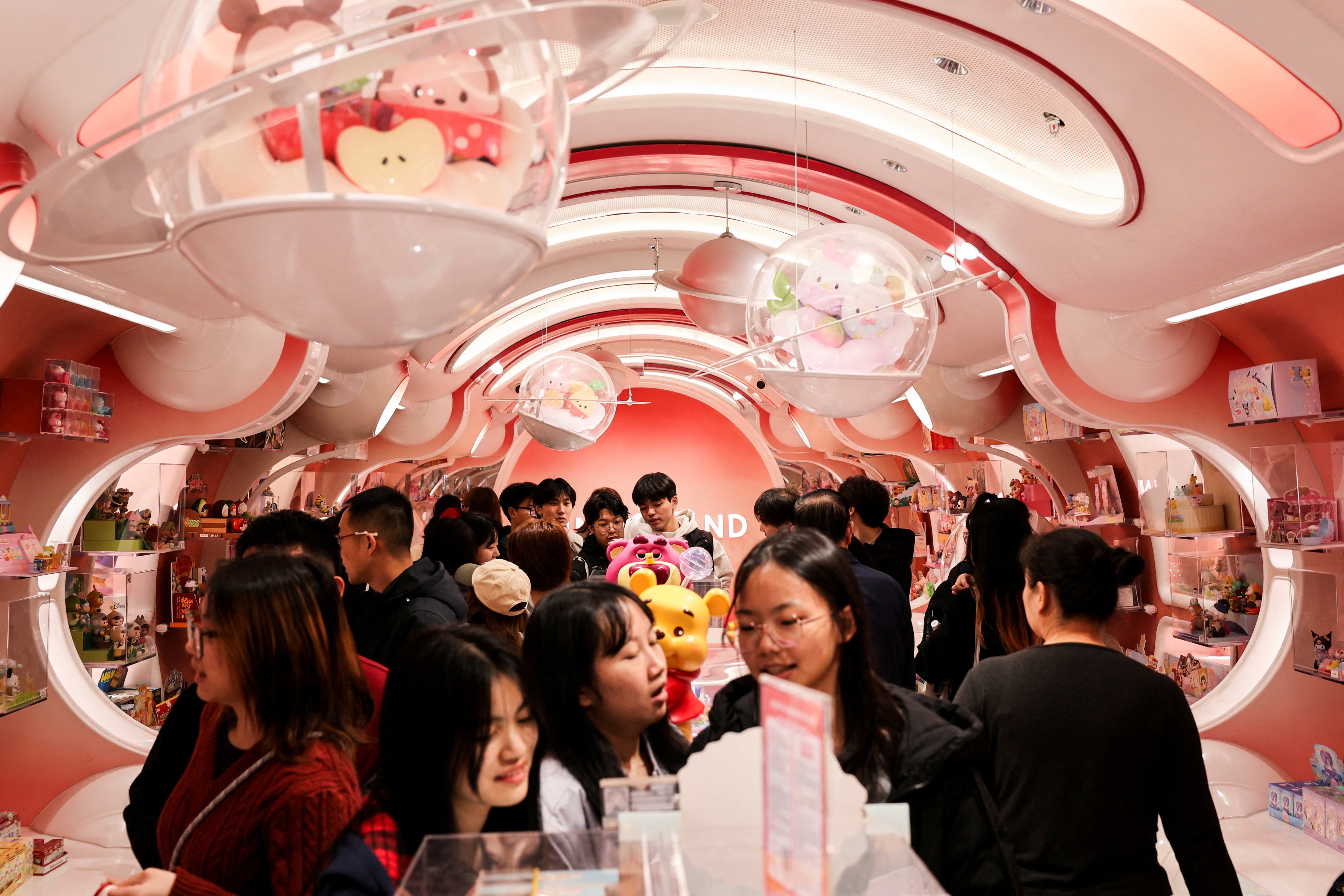 People shop at the Miniso flagship store in Shanghai, China, on February 28. Photo: Reuters