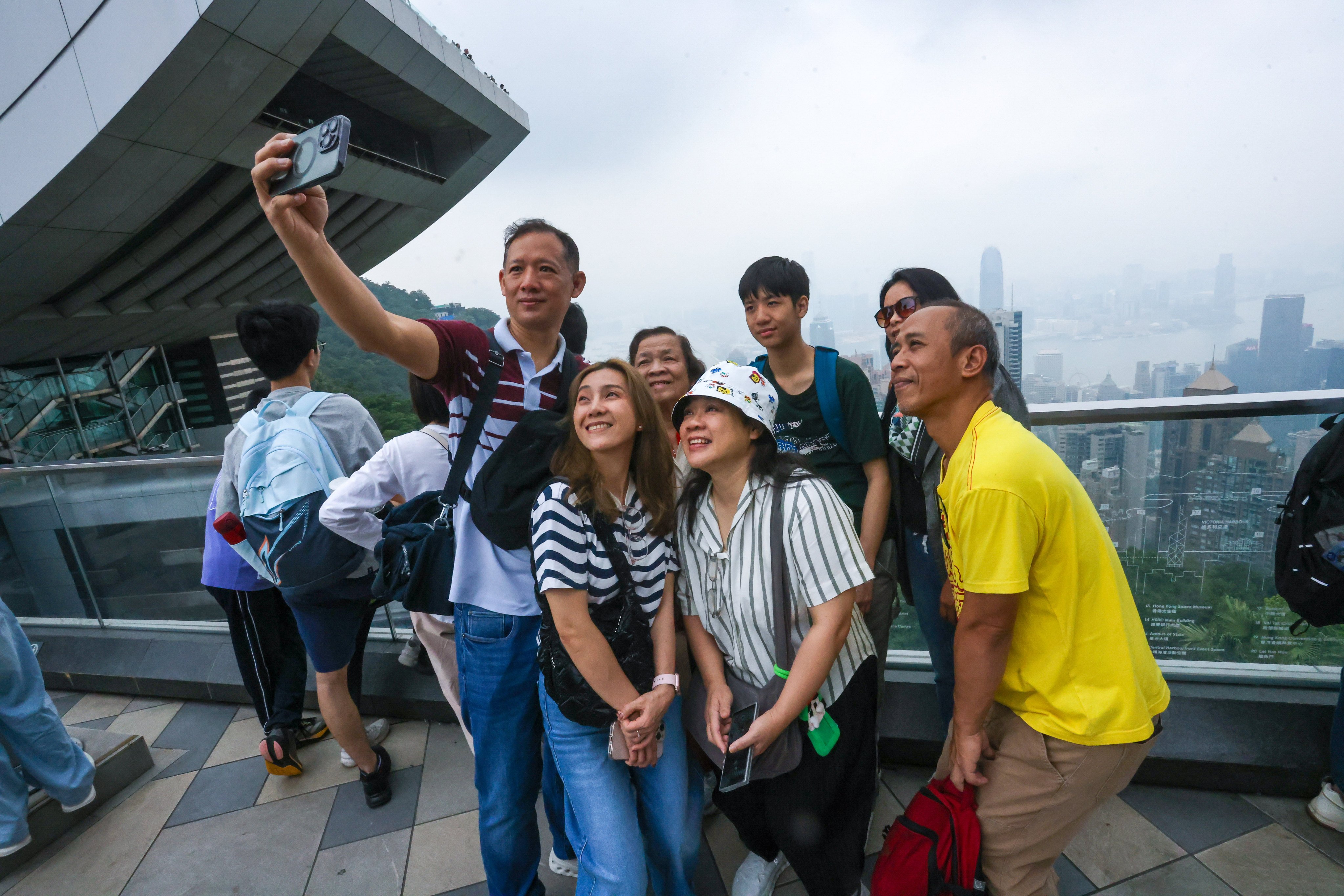 Visitors enjoy the Peak Galleria viewing deck during  the “golden week” holiday Photo: Jonathan Wong