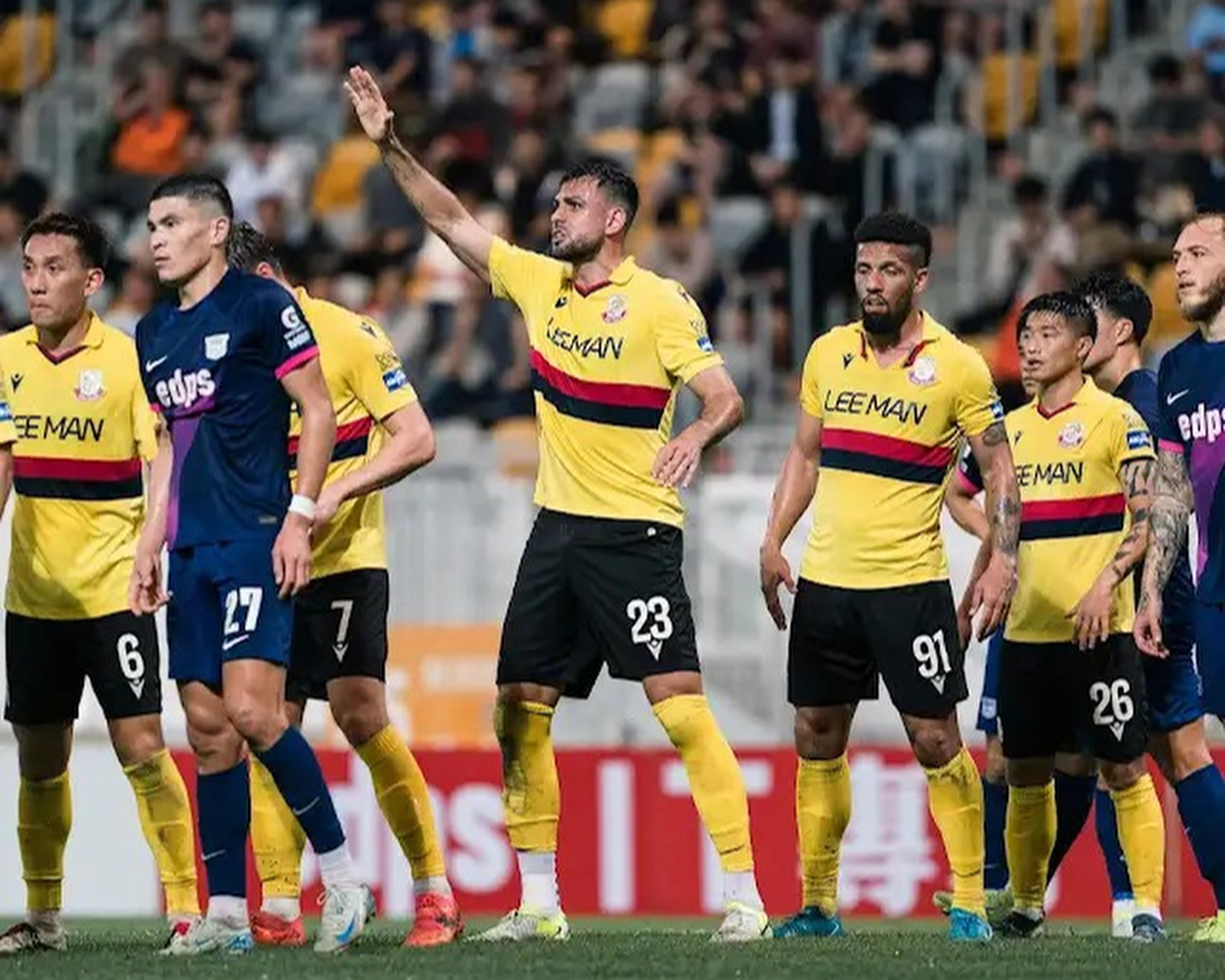 Ryan Tafazolli (centre) says he has been inundated with messages from players who want to follow in his footsteps and swap the grind of English football for career-extending spells in Hong Kong. Photo: Lee Man FC