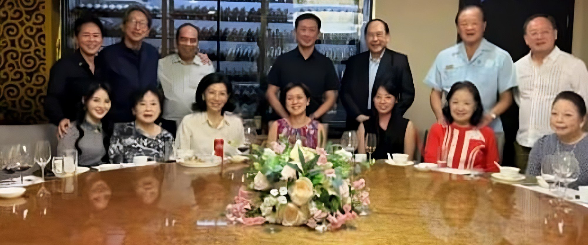 A photo circulated on social media shows Su Haijin (back row, far left) and Ong Ye Kung (back row, fourth from left) at an event. Photo: Instagram/toxicstatenarrativeinsg A photo circulated on social media shows Su Haijin (back row, far left) and Ong Ye Kung (back row, fourth from left) at an event. Photo: Instagram/toxicstatenarrativeinsg