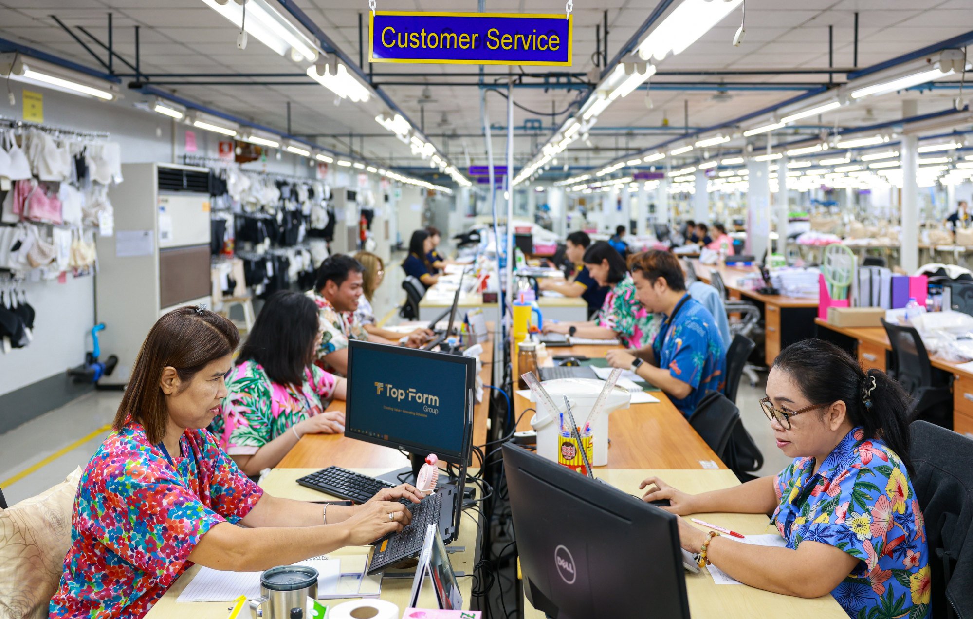 Staff at Top Form’s factory handle customer queries. China was the biggest producer and exporter of bras to the US in terms of volume and value between 2021 and last year. Photo: Handout