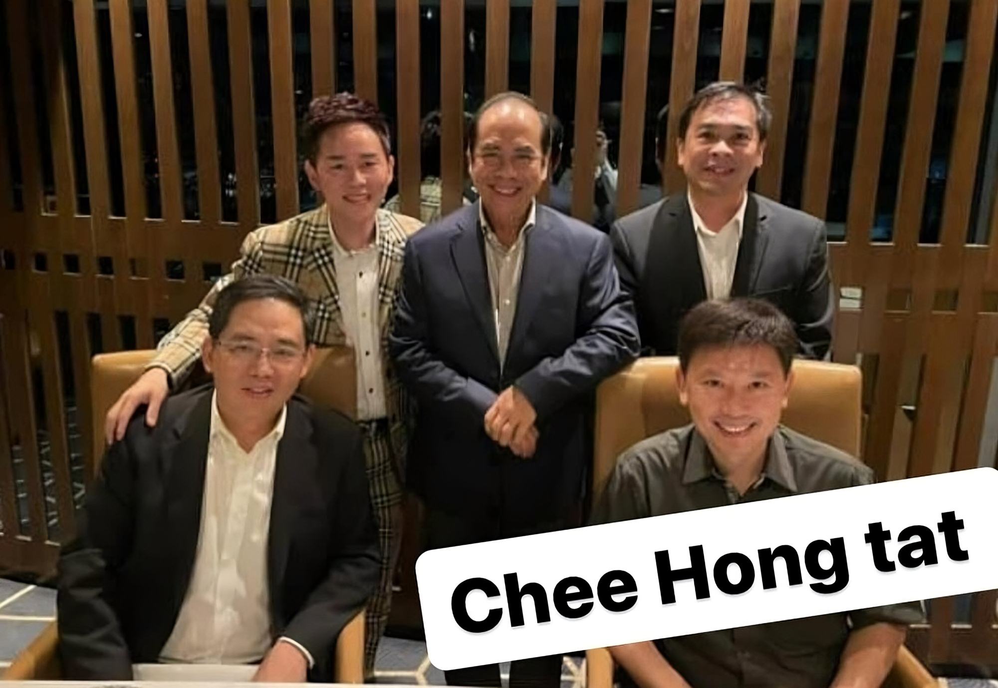 A photo circulated on social media shows Su Haijin (back row, far left) and Chee Hong Tat (front row, far right) at an event. Photo: Instagram/toxicstatenarrativeinsg A photo circulated on social media shows Su Haijin (back row, far left) and Chee Hong Tat (front row, far right) at an event. Photo: Instagram/toxicstatenarrativeinsg