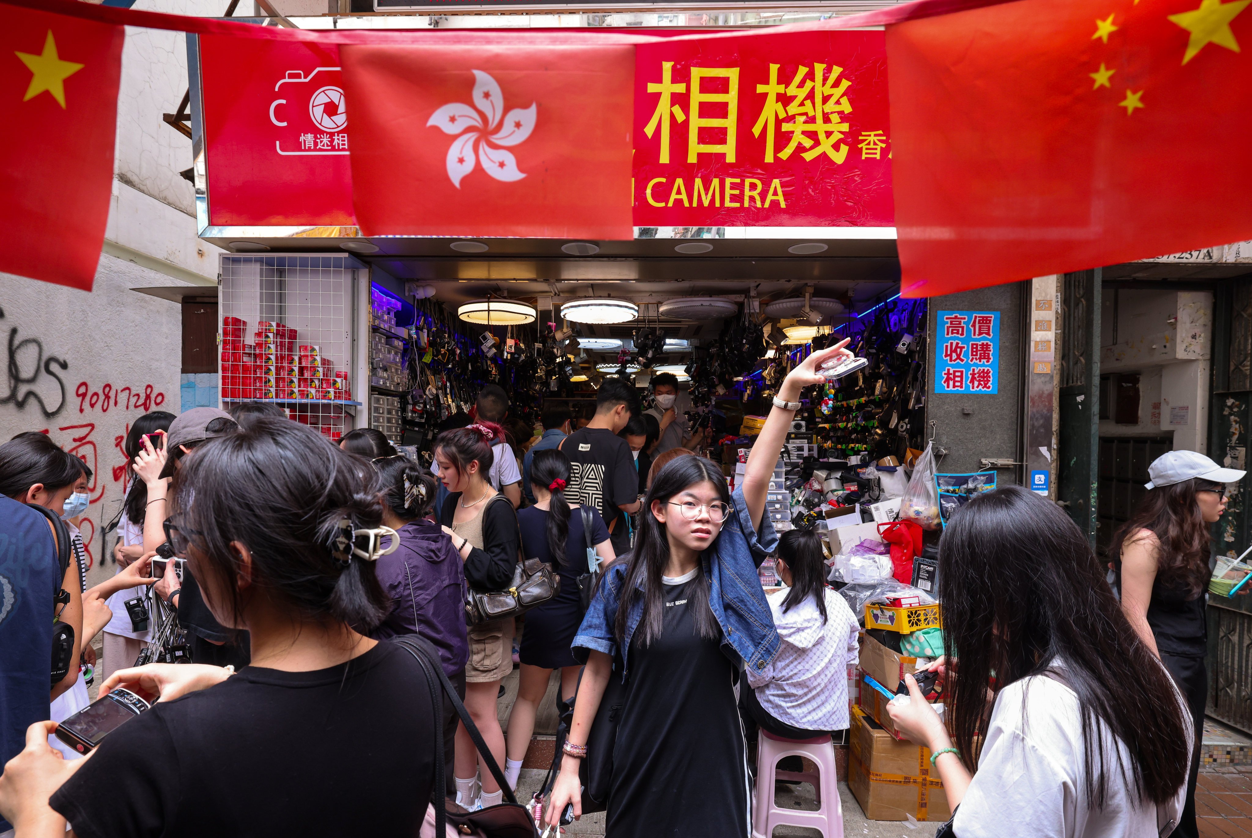 Tourists flock to a second-hand camera shop during the “golden week” holiday. Photo: Nora Tam