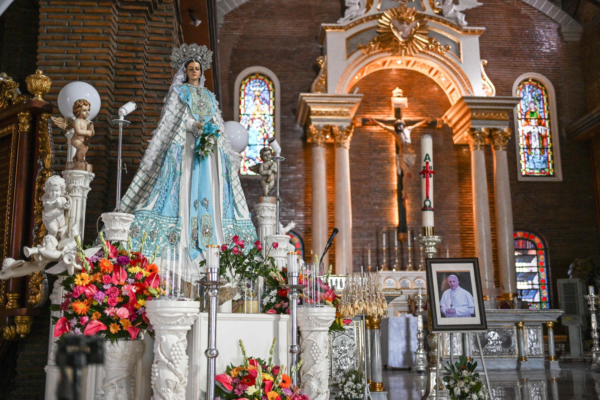 A photo of the late Pope Francis is seen inside the Imus Cathedral in Imus, Cavite province. Photo: AFP A photo of the late Pope Francis is seen inside the Imus Cathedral in Imus, Cavite province. Photo: AFP