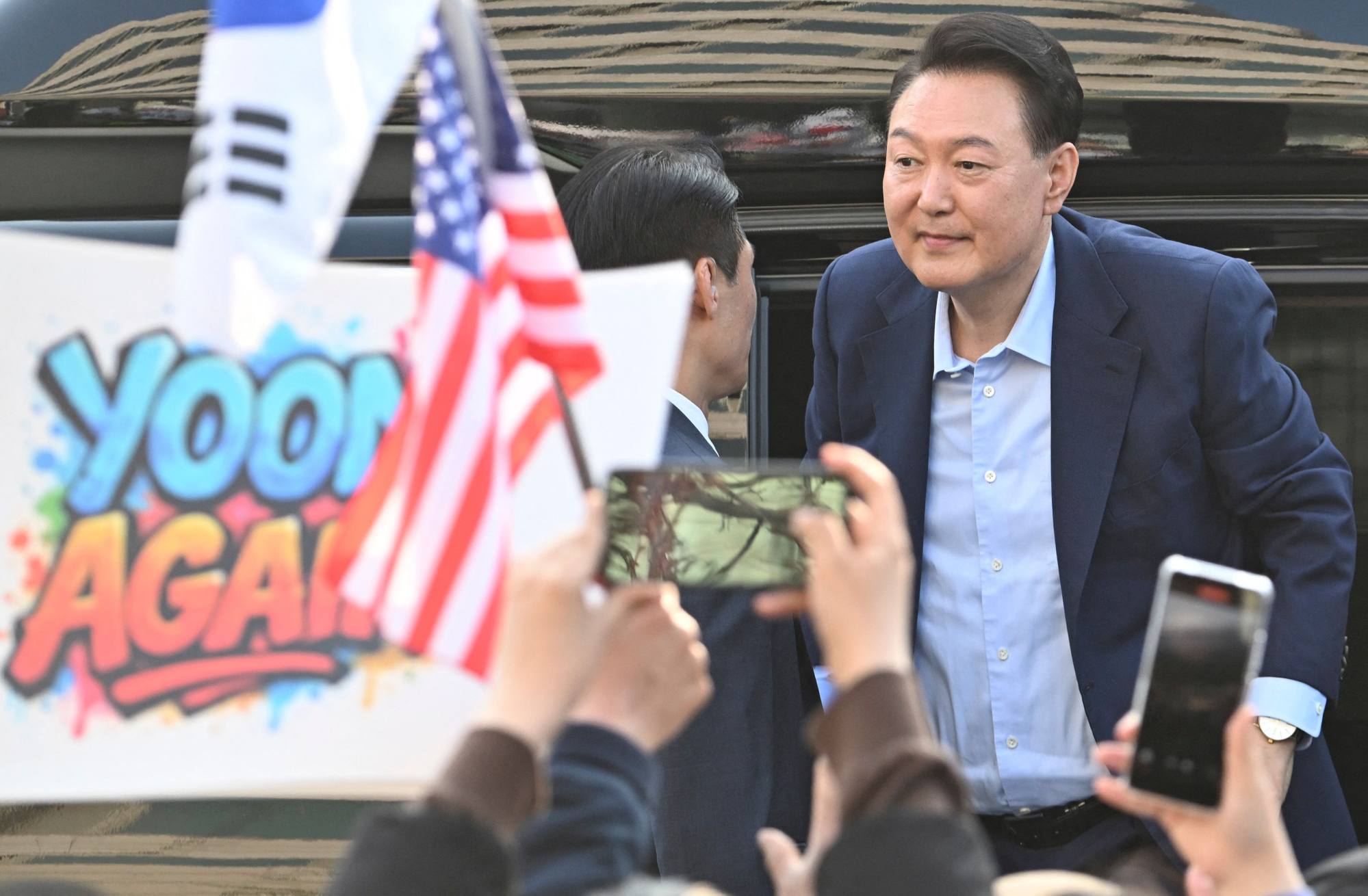 Ousted South Korean president Yoon Suk-yeol leaves the official residence in Seoul on April 11. Photo: AFP Ousted South Korean president Yoon Suk-yeol leaves the official residence in Seoul on April 11. Photo: AFP