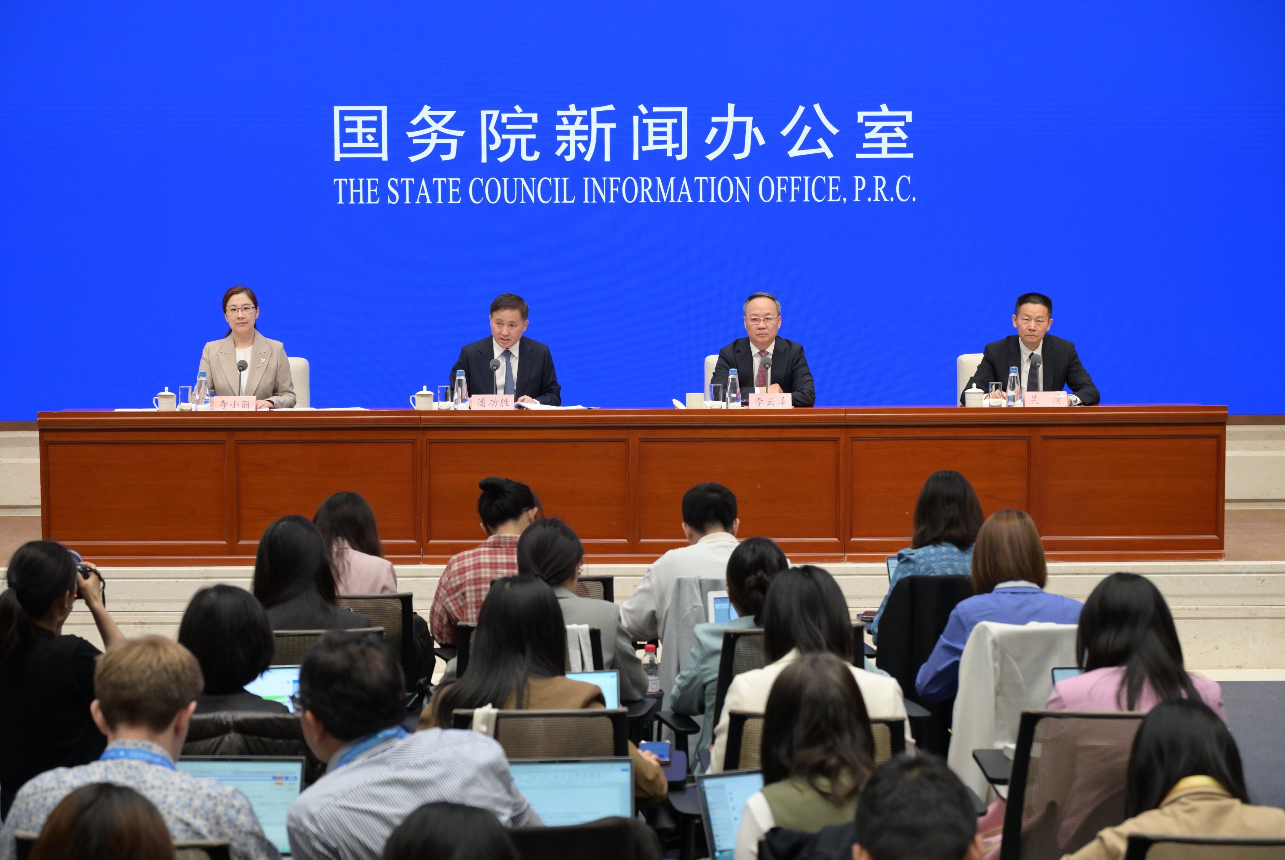 China’s top financial officials announce a series of measures to boost the economy and stabilise capital markets during a press conference in Beijing on Wednesday. Photo: Handout