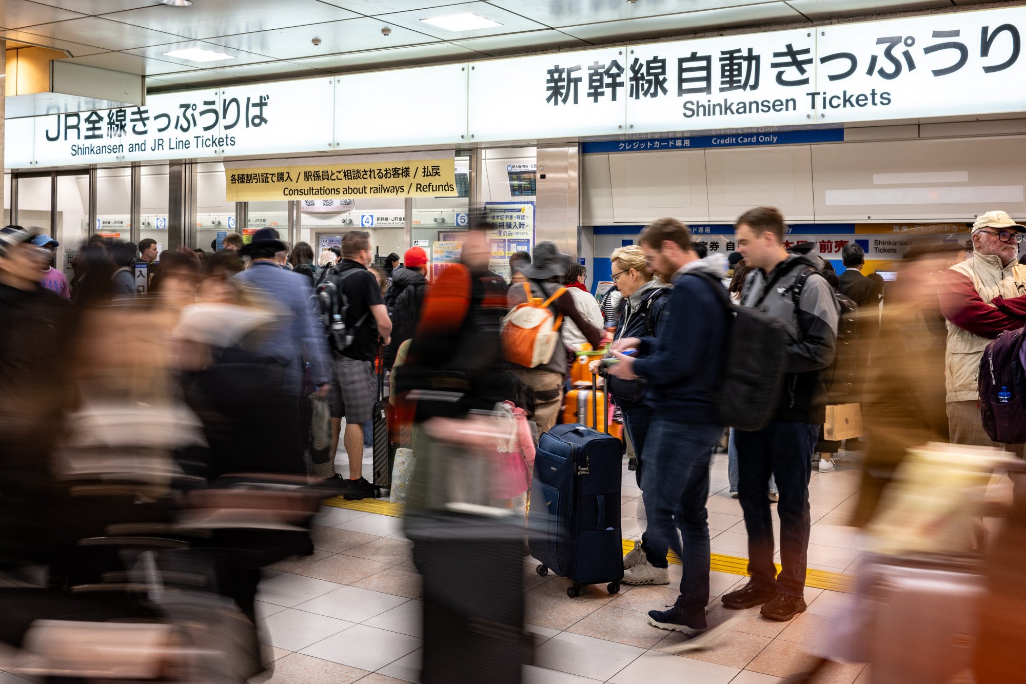 Foreign tourists gather at Kyoto station. Photo: AFP Foreign tourists gather at Kyoto station. Photo: AFP