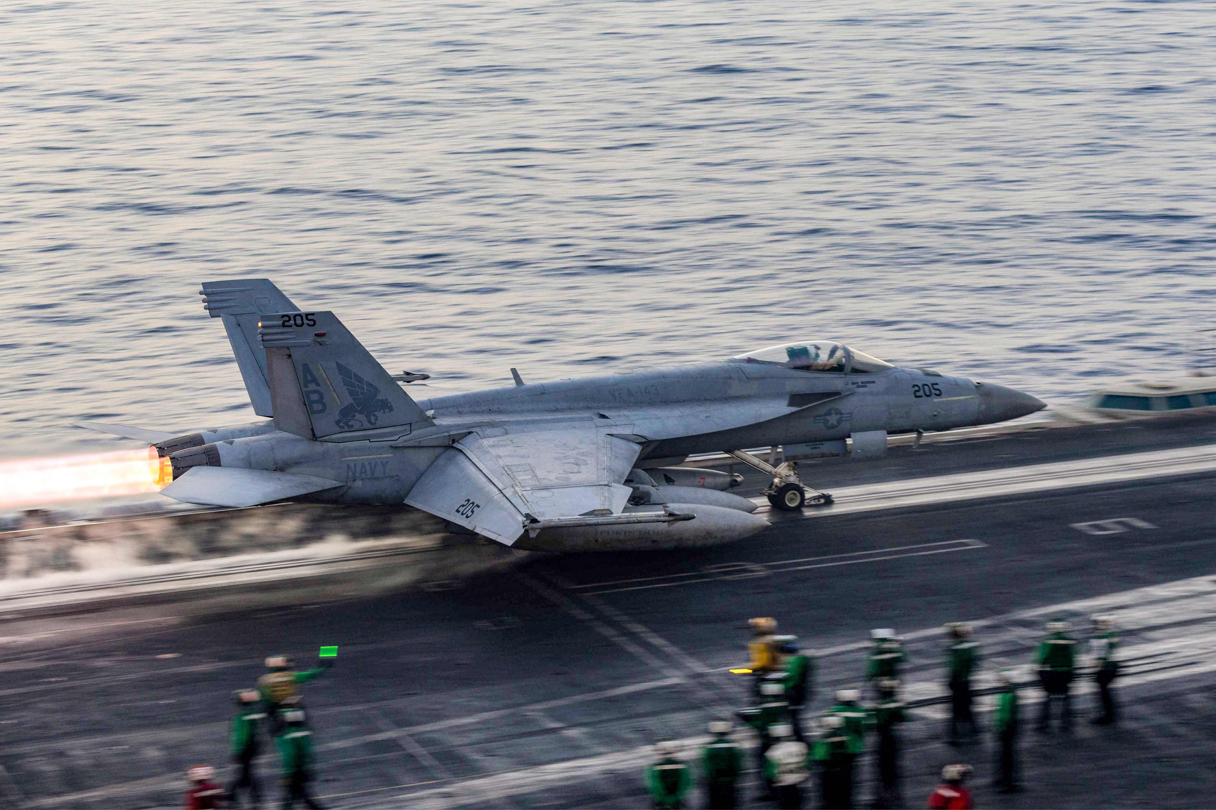 A US F/A-18 fighter jet takes off from the USS Harry S. Truman aircraft carrier on March 16. Photo: US Navy via AFP