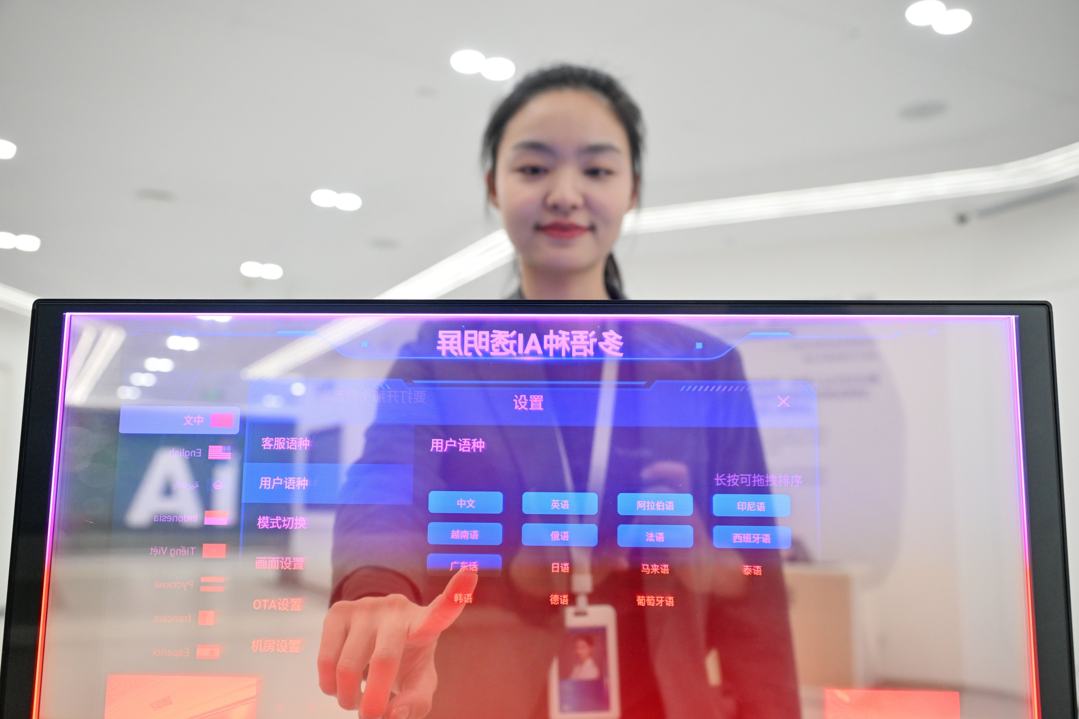A staff member at an AI start-up demonstrates a translation system. Photo: Xinhua